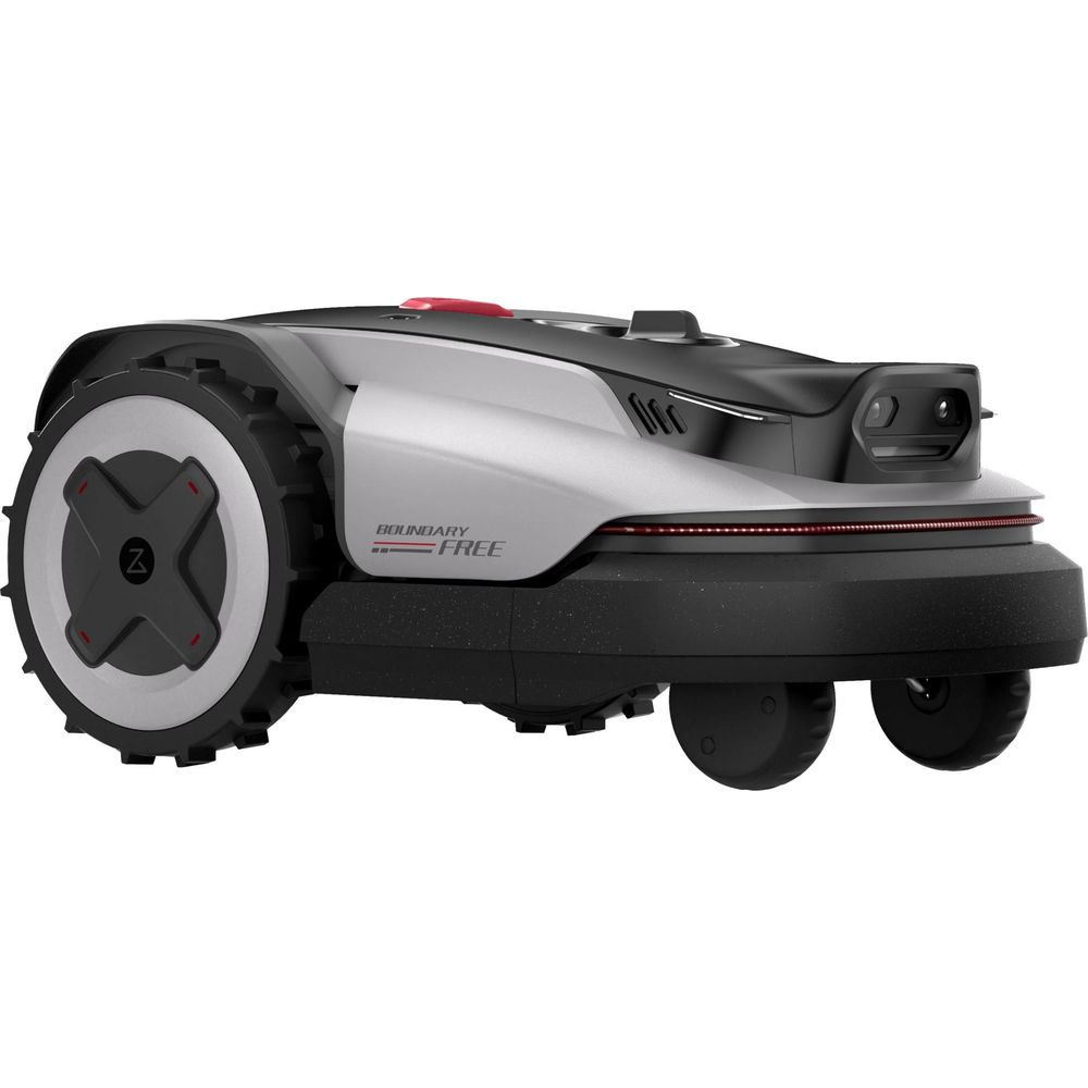 Ein moderner Mähroboter mit silbernem und schwarzem Gehäuse und großen Rädern.