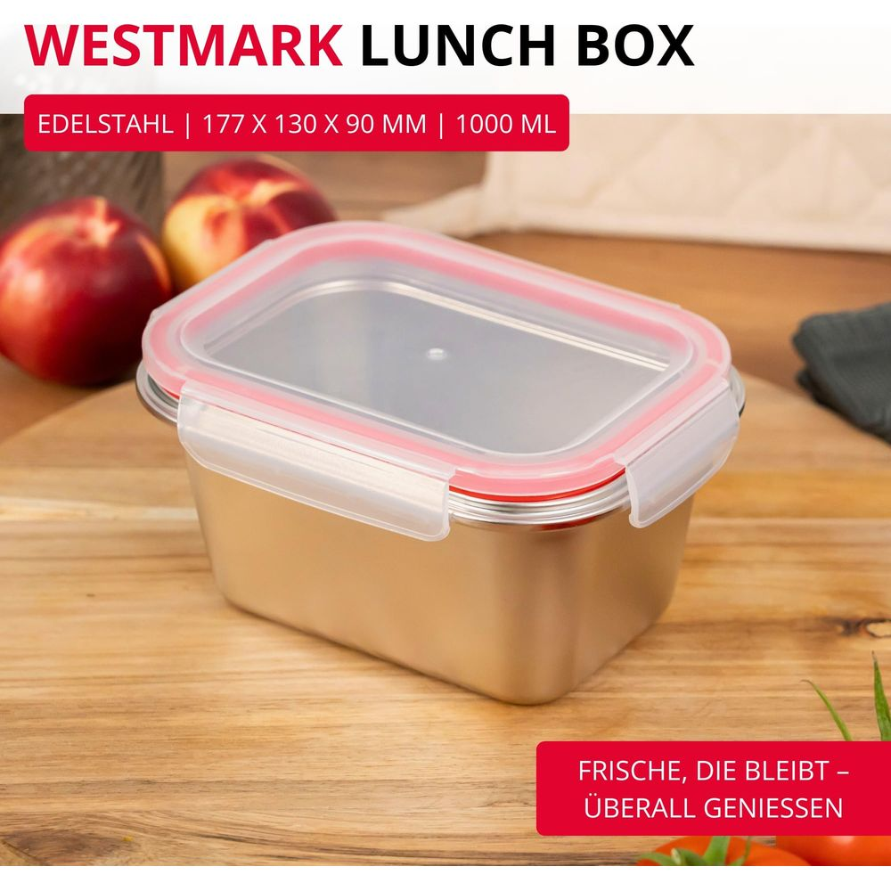 Westmark Lunch Box aus Edelstahl mit rotem Deckel, daneben Pfirsiche.