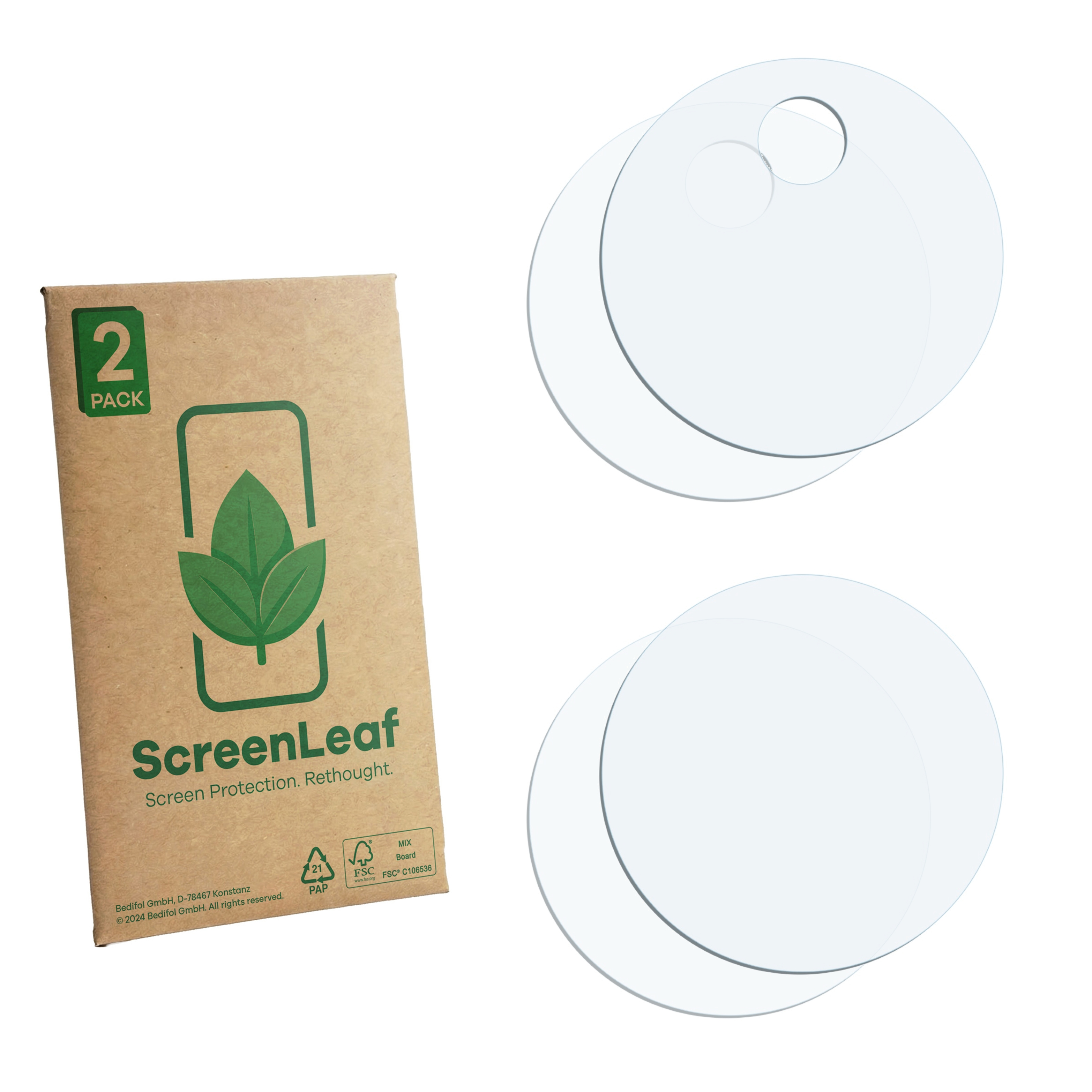 Zwei runde Displayschutzfolien neben einer braunen Verpackung mit grüner Blattgrafik.