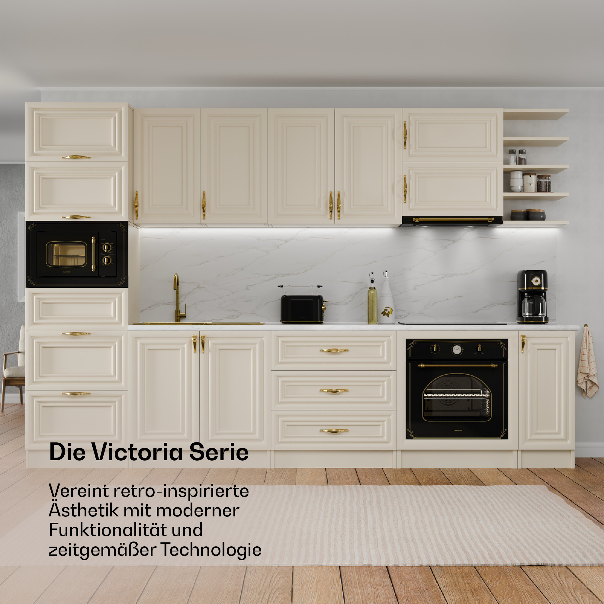 Eine cremefarbene Küche mit schwarzen Geräten und goldenen Beschlägen.