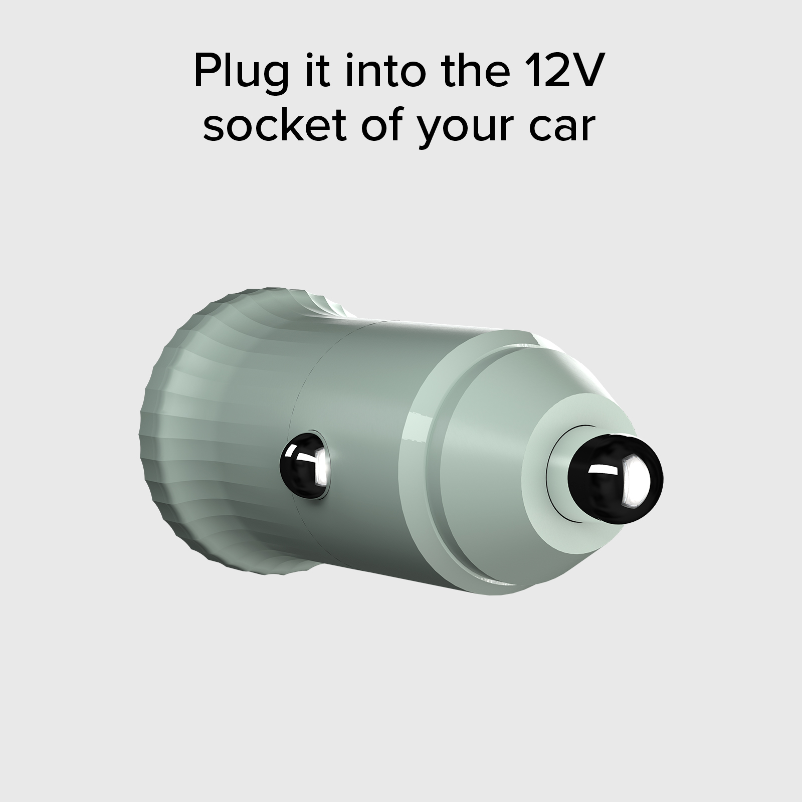 Un enchufe de coche verde claro de 12V con parte delantera cónica lisa y carcasa trasera acanalada.