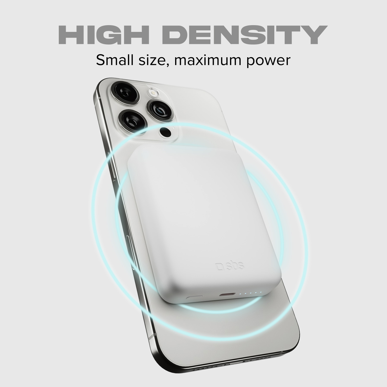 Un power bank bianco è attaccato al retro di uno smartphone bianco.
