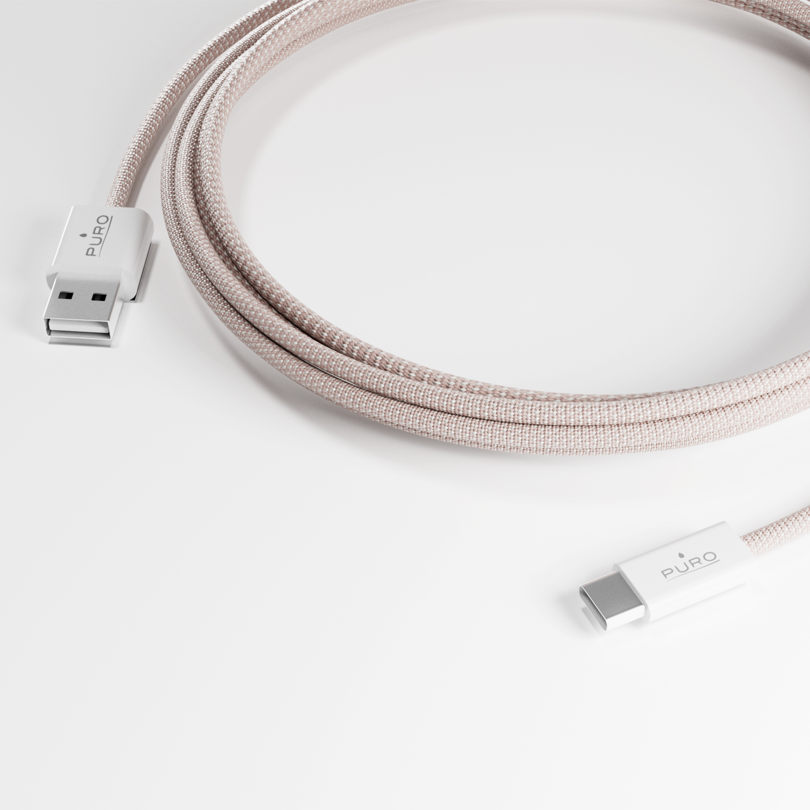 Un cavo USB-C a USB-A rosa con logo PURO su sfondo bianco.