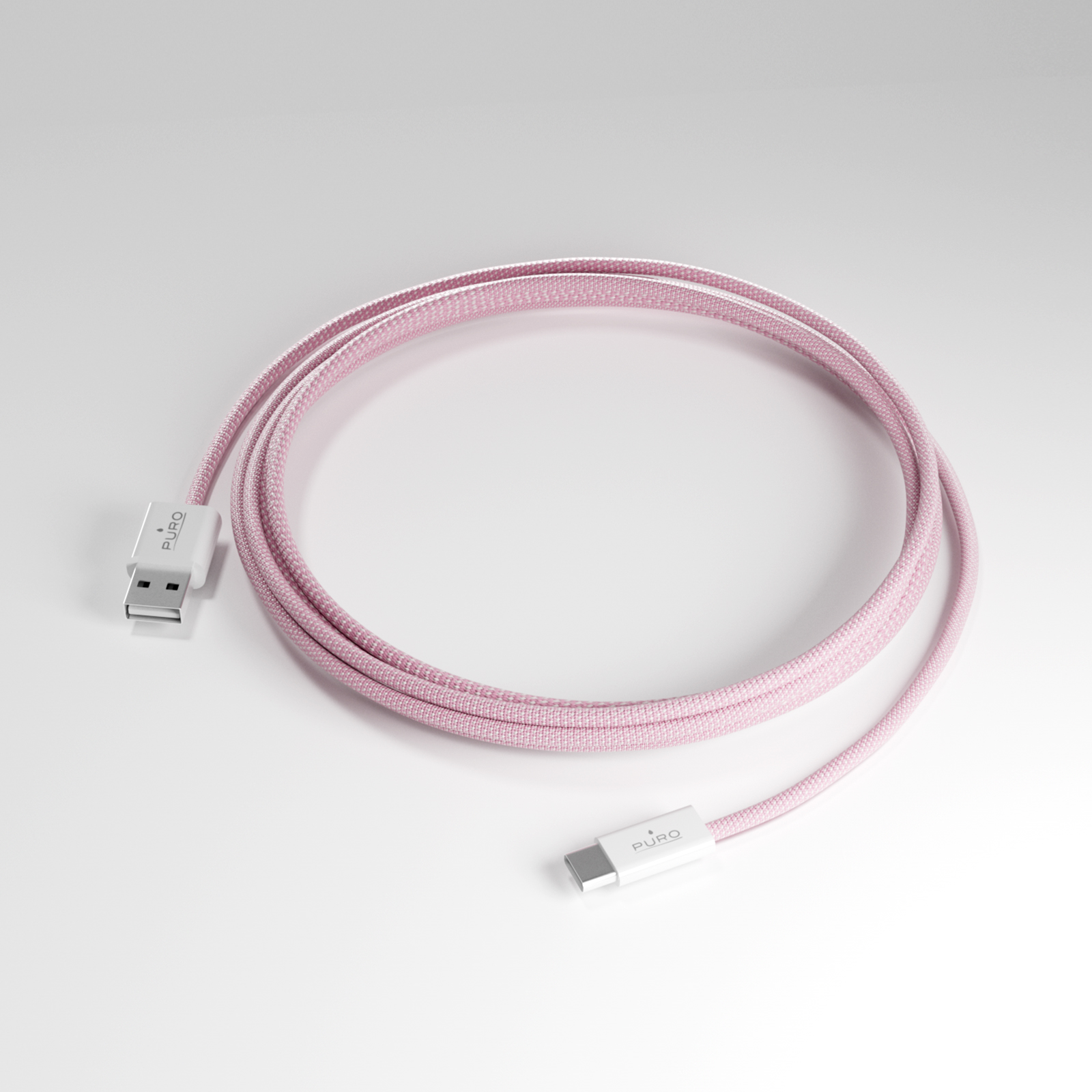 Un cavo da USB-C a USB-A rosa con connettori bianchi su sfondo bianco.