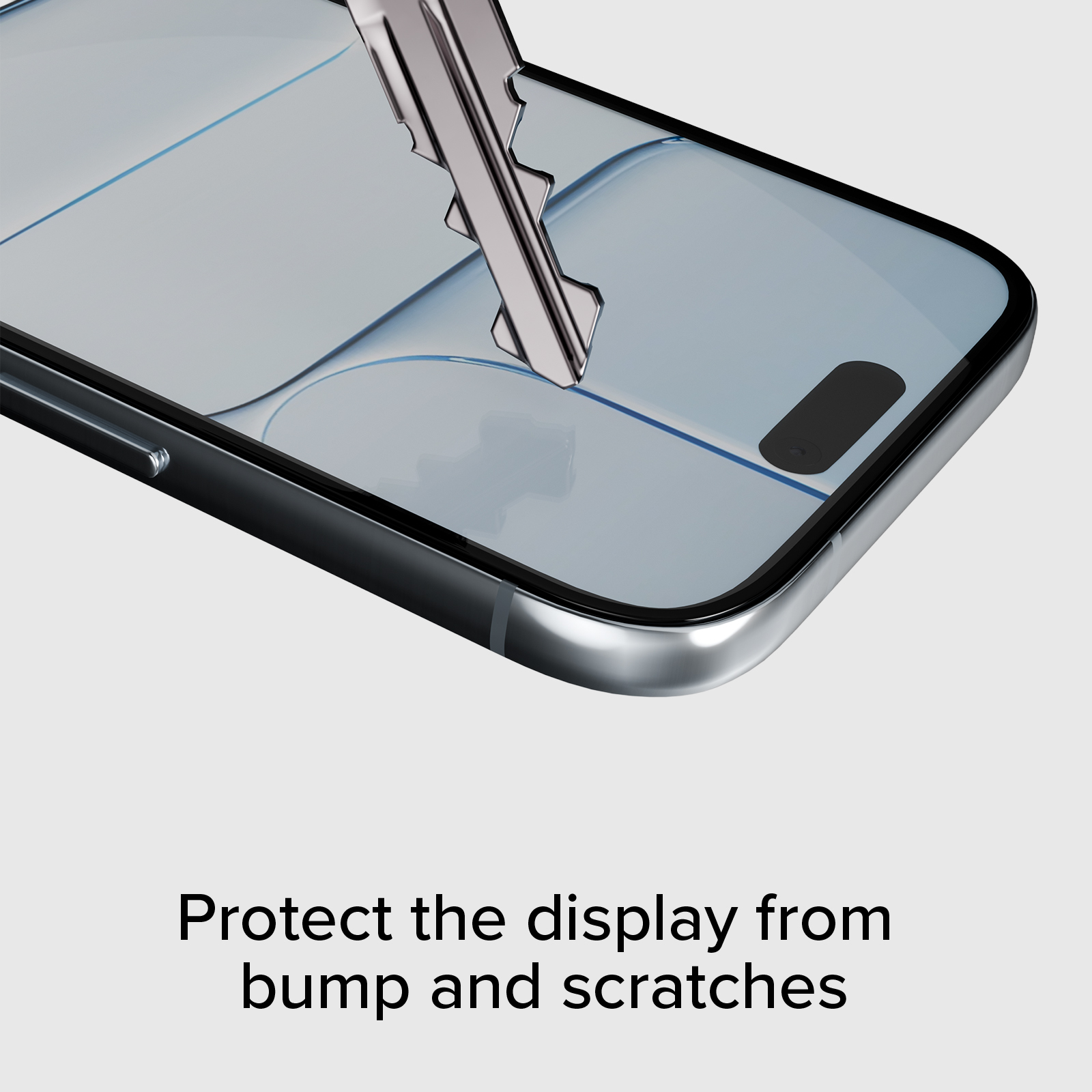 Schutzfolie auf einem Smartphone-Display, das von einem Schlüssel zerkratzt wird.