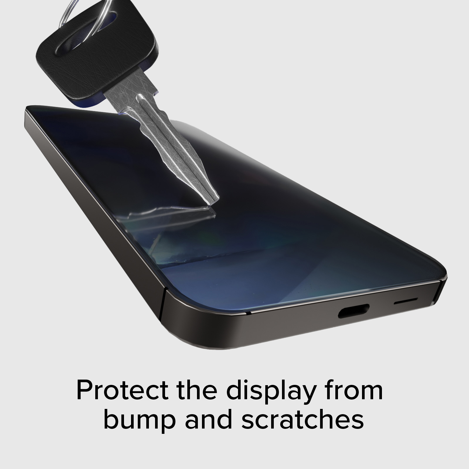 Una chiave per auto graffia lo schermo di uno smartphone.