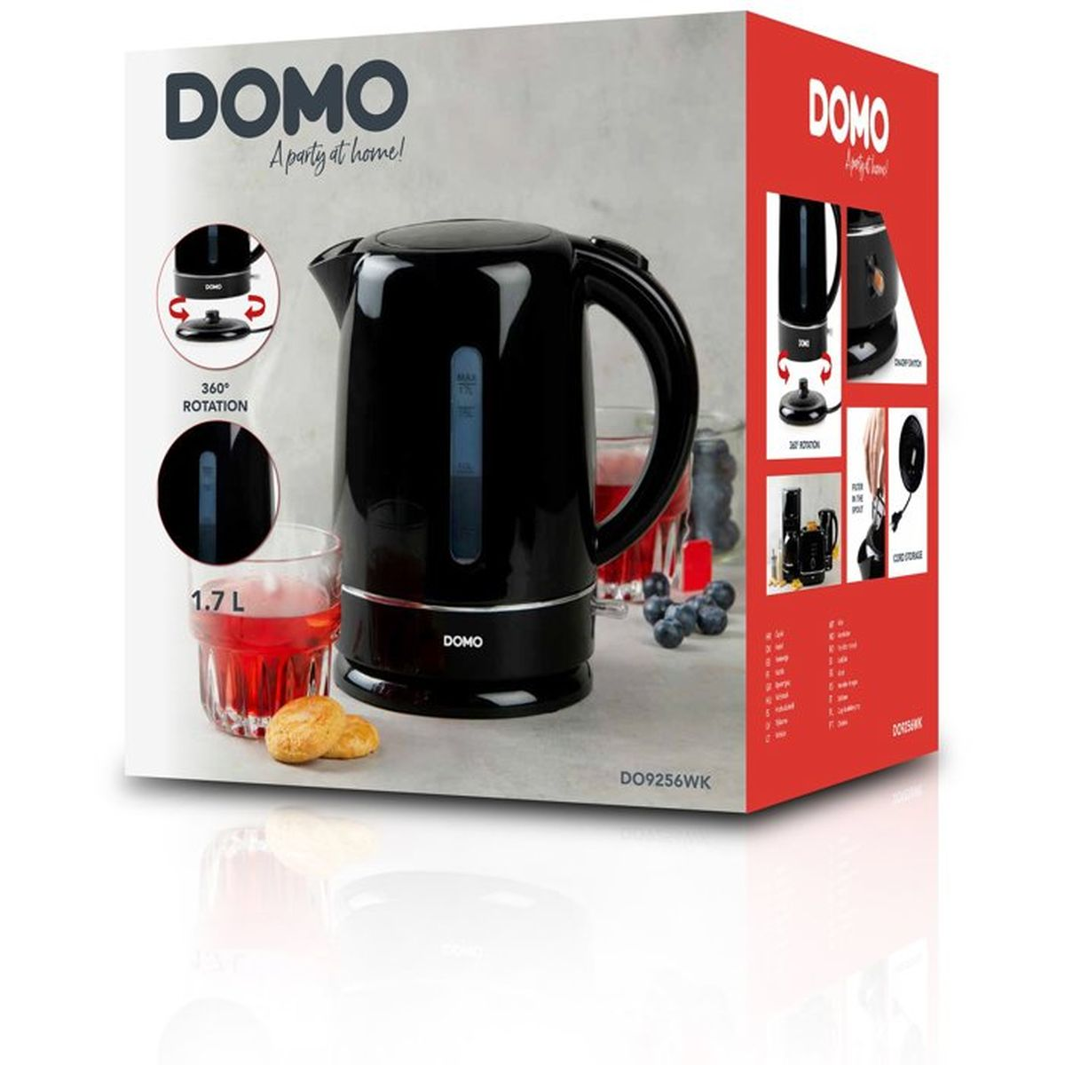Bollitore nero DOMO da 1,7 L accanto a bicchiere e biscotti.