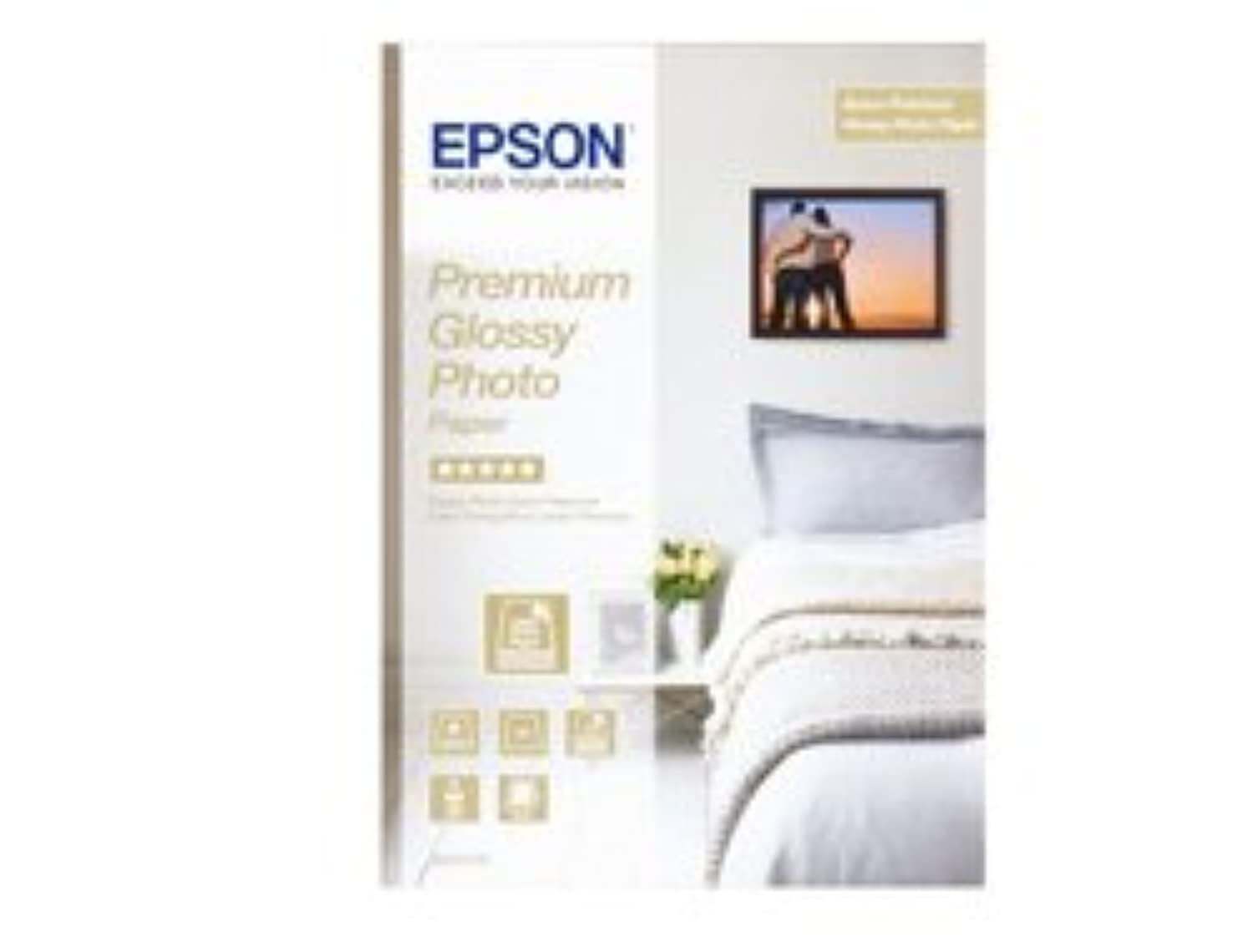 Confezione di carta fotografica lucida Epson con un letto sullo sfondo.