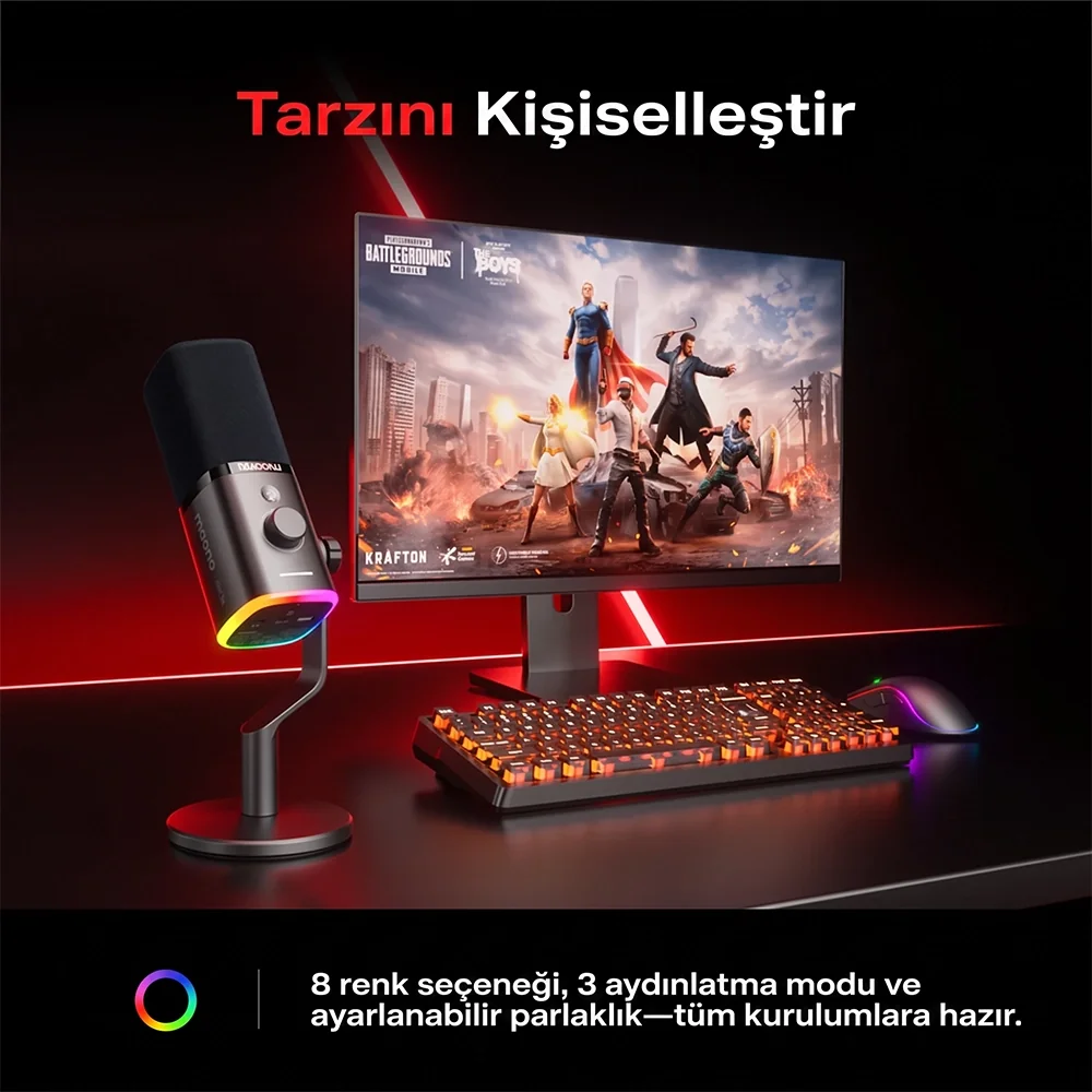 A gaming setup featuring a lit microphone, keyboard, and mouse in front of a monitor.