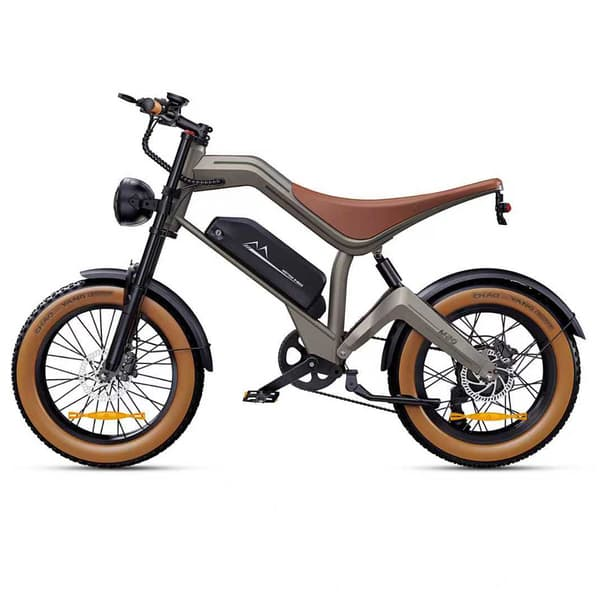 Bicicletta elettrica grigia con sella marrone, pneumatici larghi e faro nero.