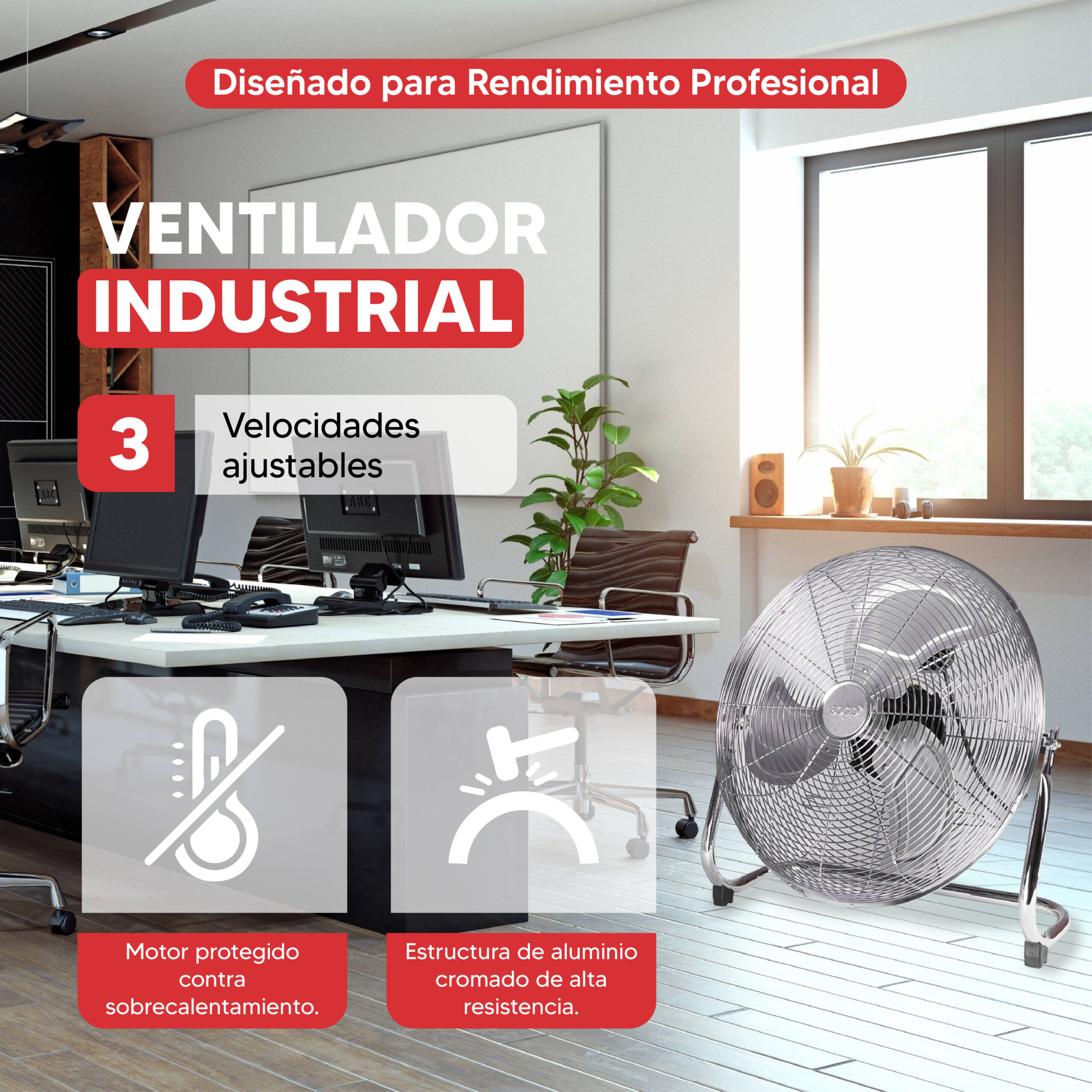 Un ventilador industrial plateado de 3 velocidades está en un suelo de madera junto a un escritorio.