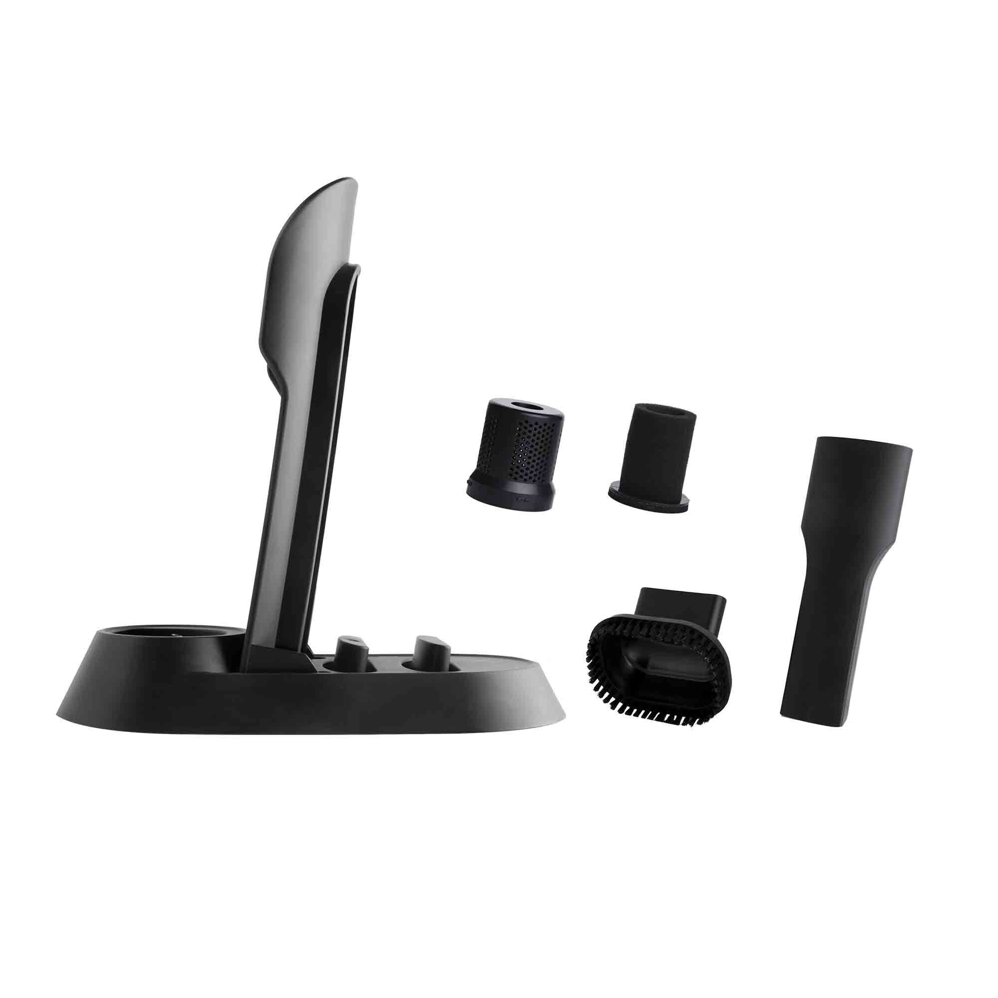 Soporte de carga negro con varios accesorios de aspiradora.