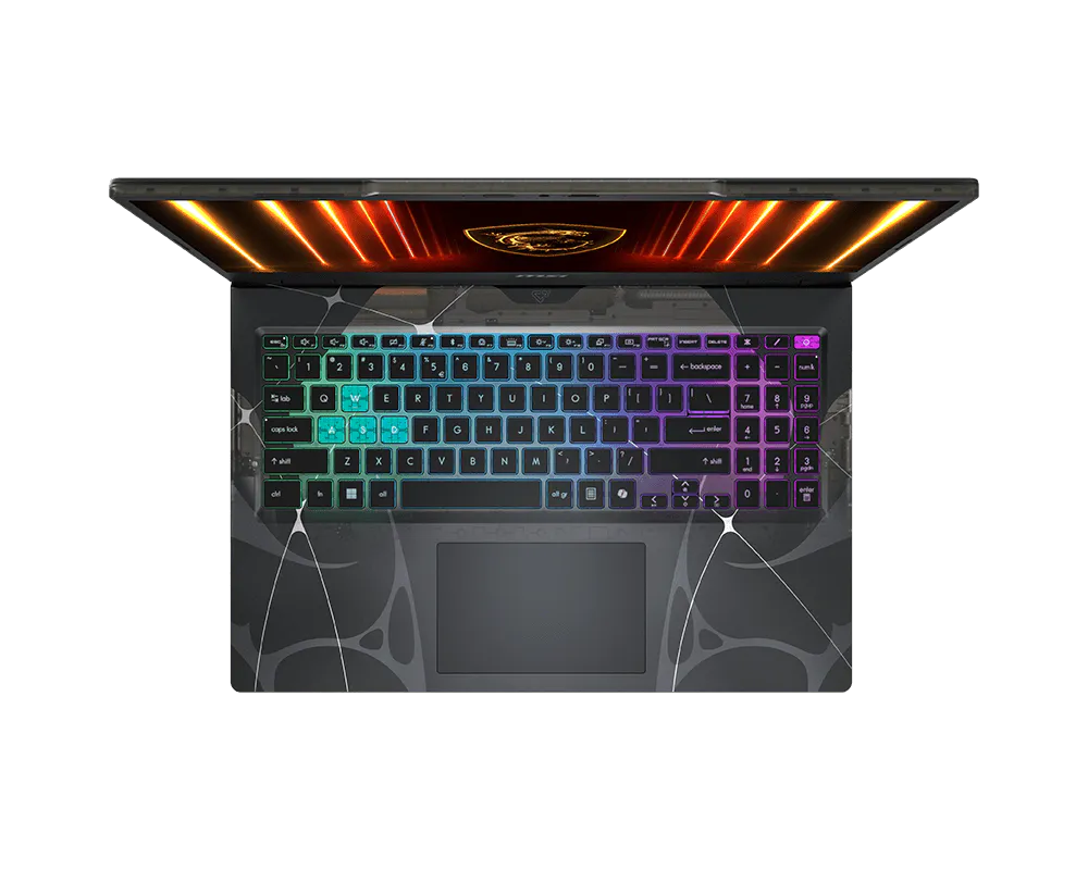 Un laptop aperto con tastiera illuminata arcobaleno su sfondo nero.