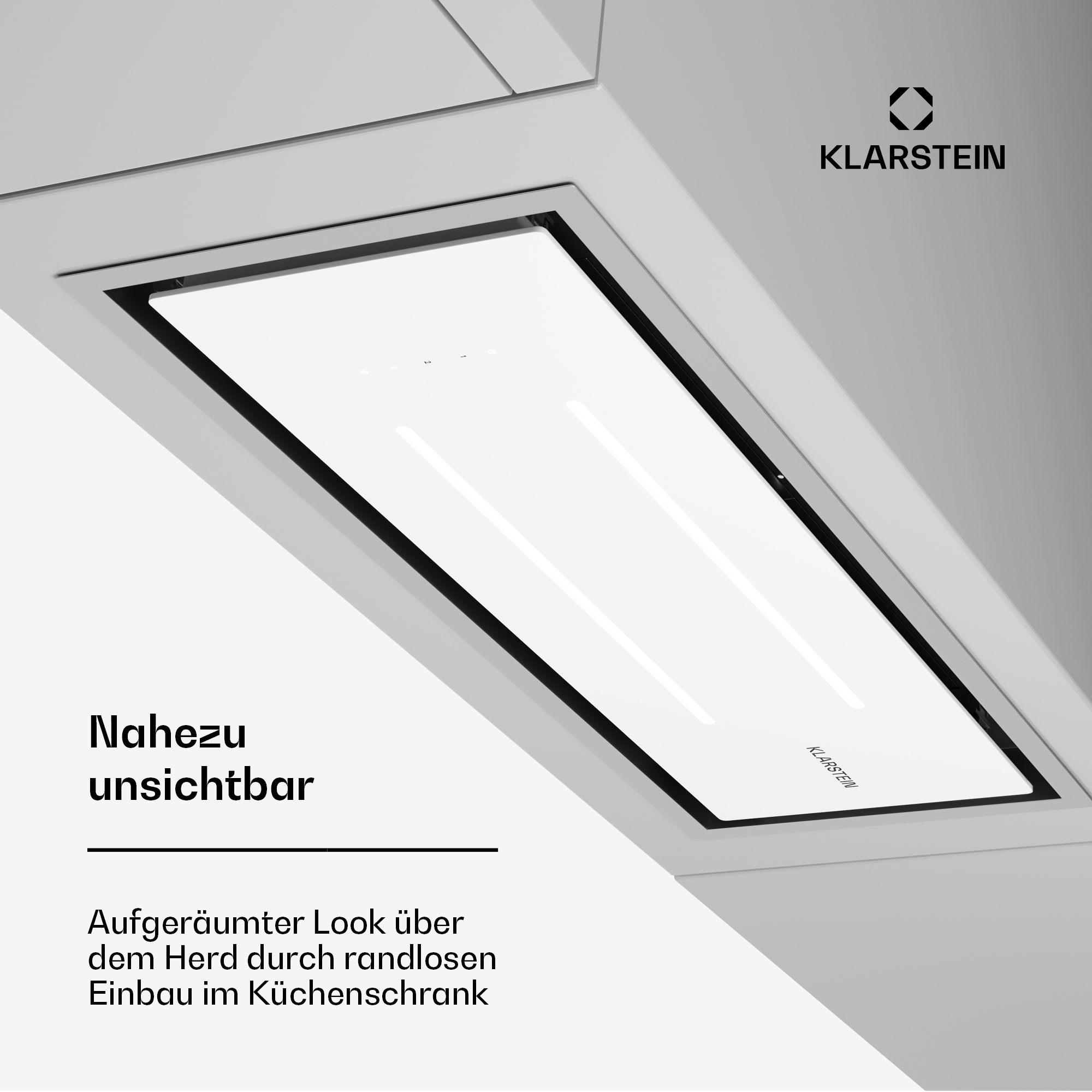 Integrierte Dunstabzugshaube mit weißer Glasoberfläche und KLARSTEIN Logo.