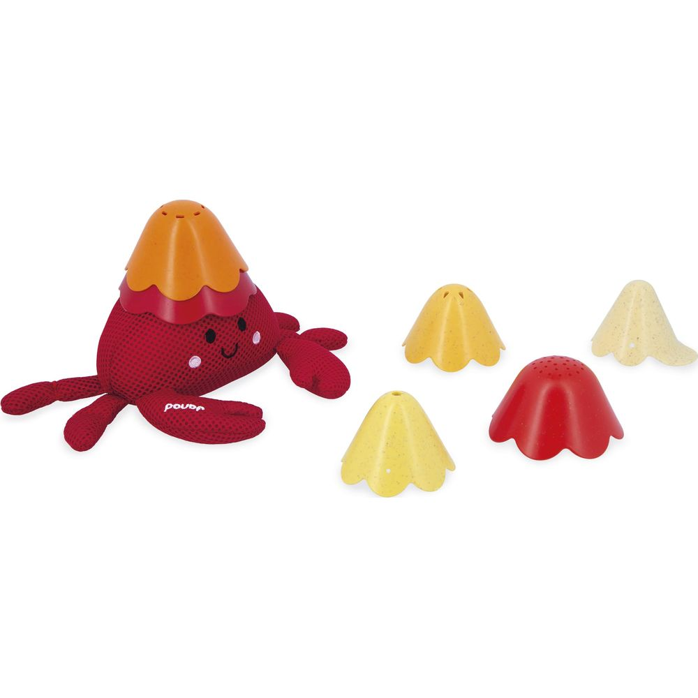 Ein roter Krebs-Stofftier mit einem orangefarbenen Hut und vier bunten Bechern daneben.