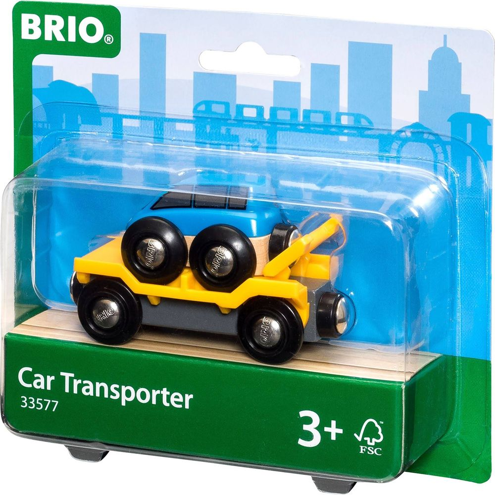 Gelber BRIO Autotransporter mit blauem Führerhaus und schwarzen Rädern.