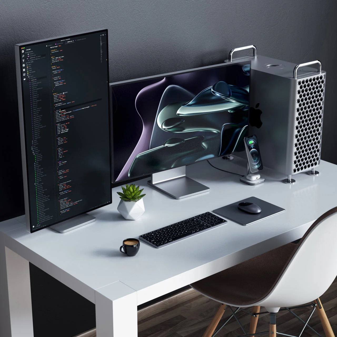 A desk with two monitors, keyboard, mouse, computer, and a coffee cup.