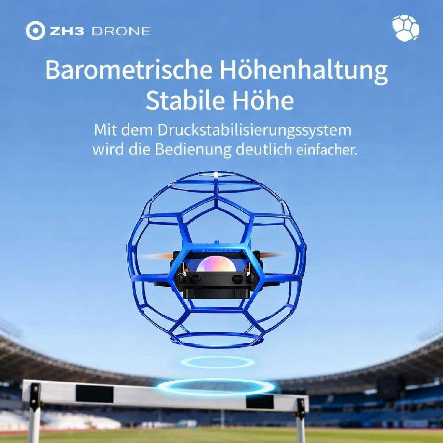 Blauer Drohnenball mit Propellern schwebt über Hürde, Stadion im Hintergrund.