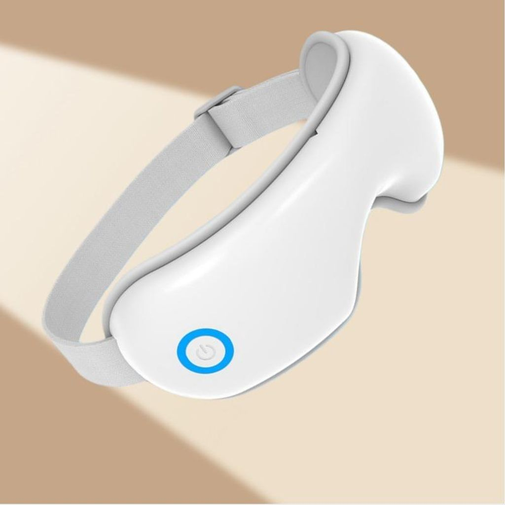 Ein weißes Massagegerät für die Augenpartie mit blauem Ein/Aus-Symbol auf beige Hintergrund.