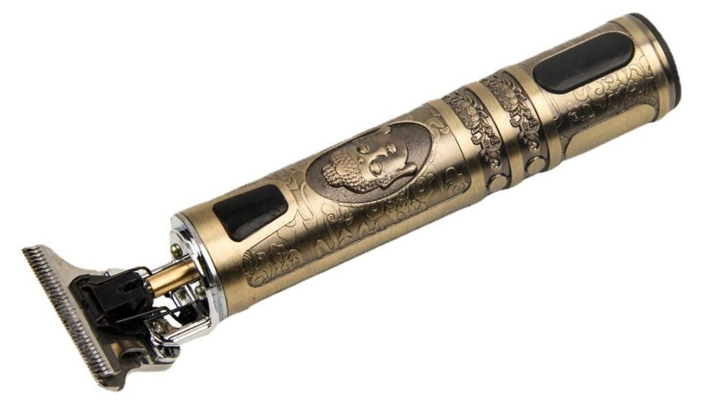 Antiker goldener Haarschneider mit gravierten Verzierungen und einem Porträt.