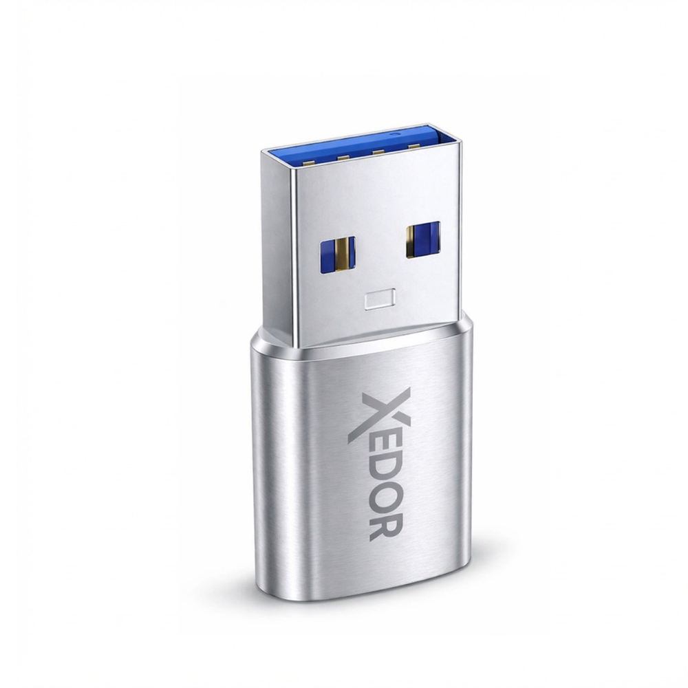 Silver USB flash drive with blue connector and Xedor logo.