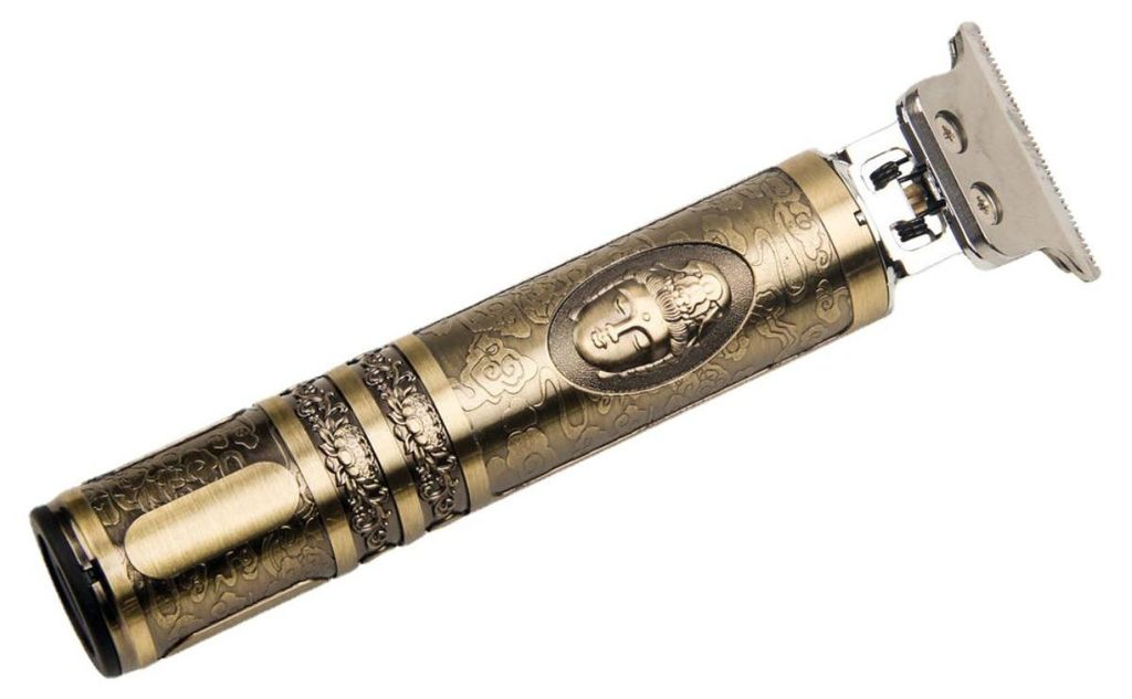 Ein goldener Trimmer mit Buddha-Motiv und detaillierten Mustern.