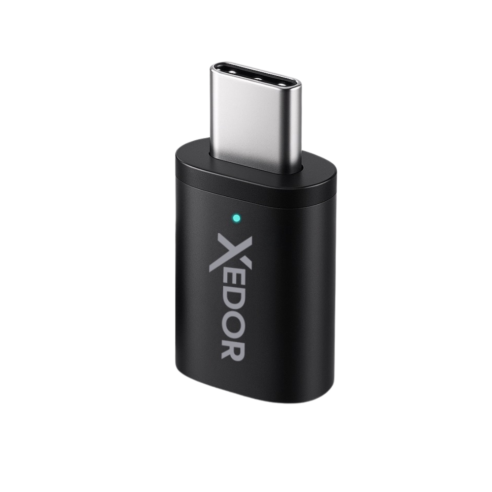 Black USB-C adapter with a silver tip and a blue light.