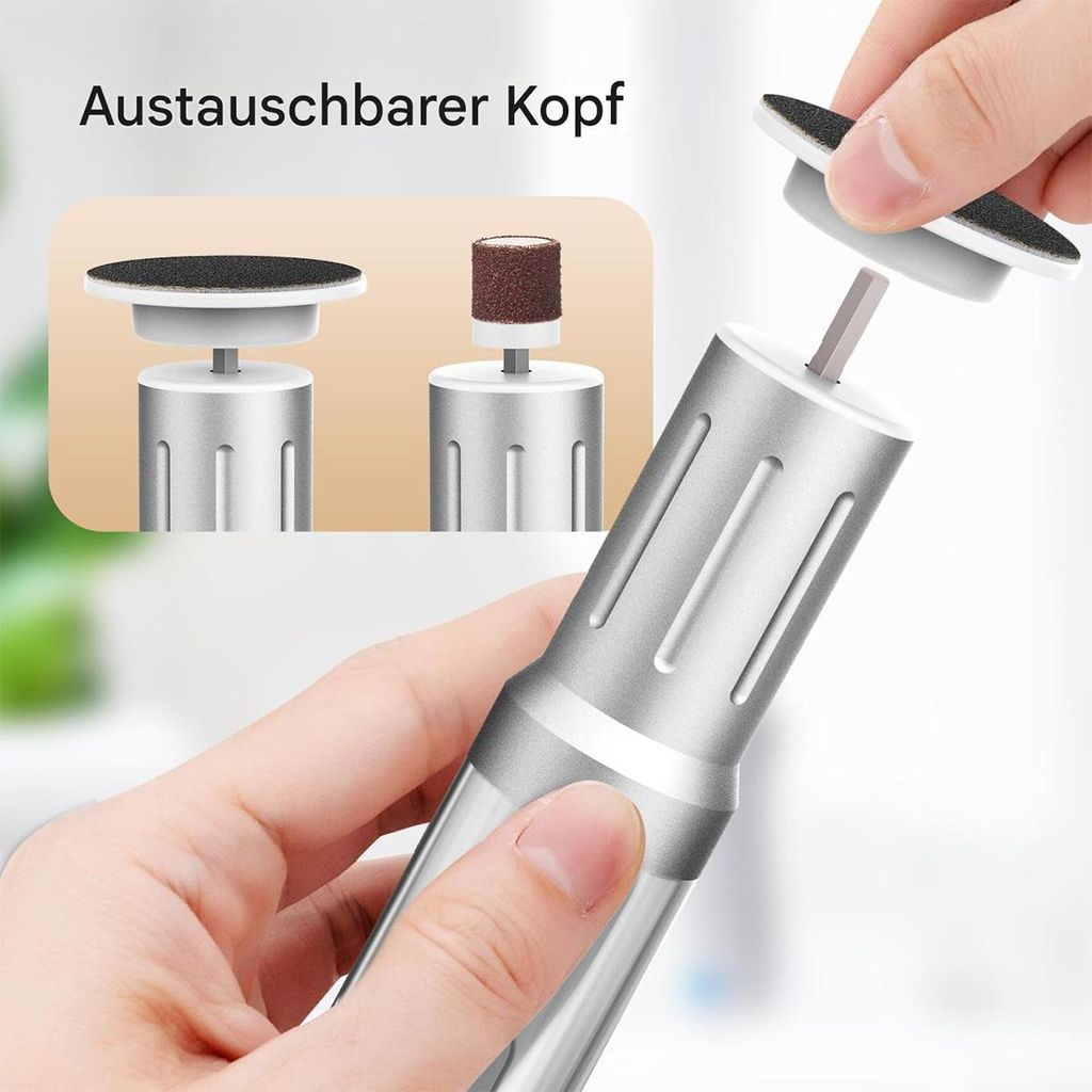 Nahaufnahme eines silbernen Nagelfräsergriffs mit austauschbaren Aufsätzen.