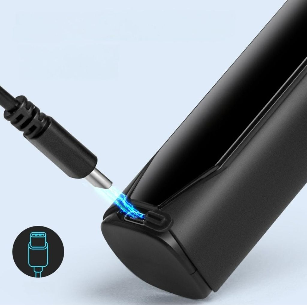 Ein schwarzes Kabel wird in ein schwarzes Gerät gesteckt, blaue Blitze um den Anschluss.