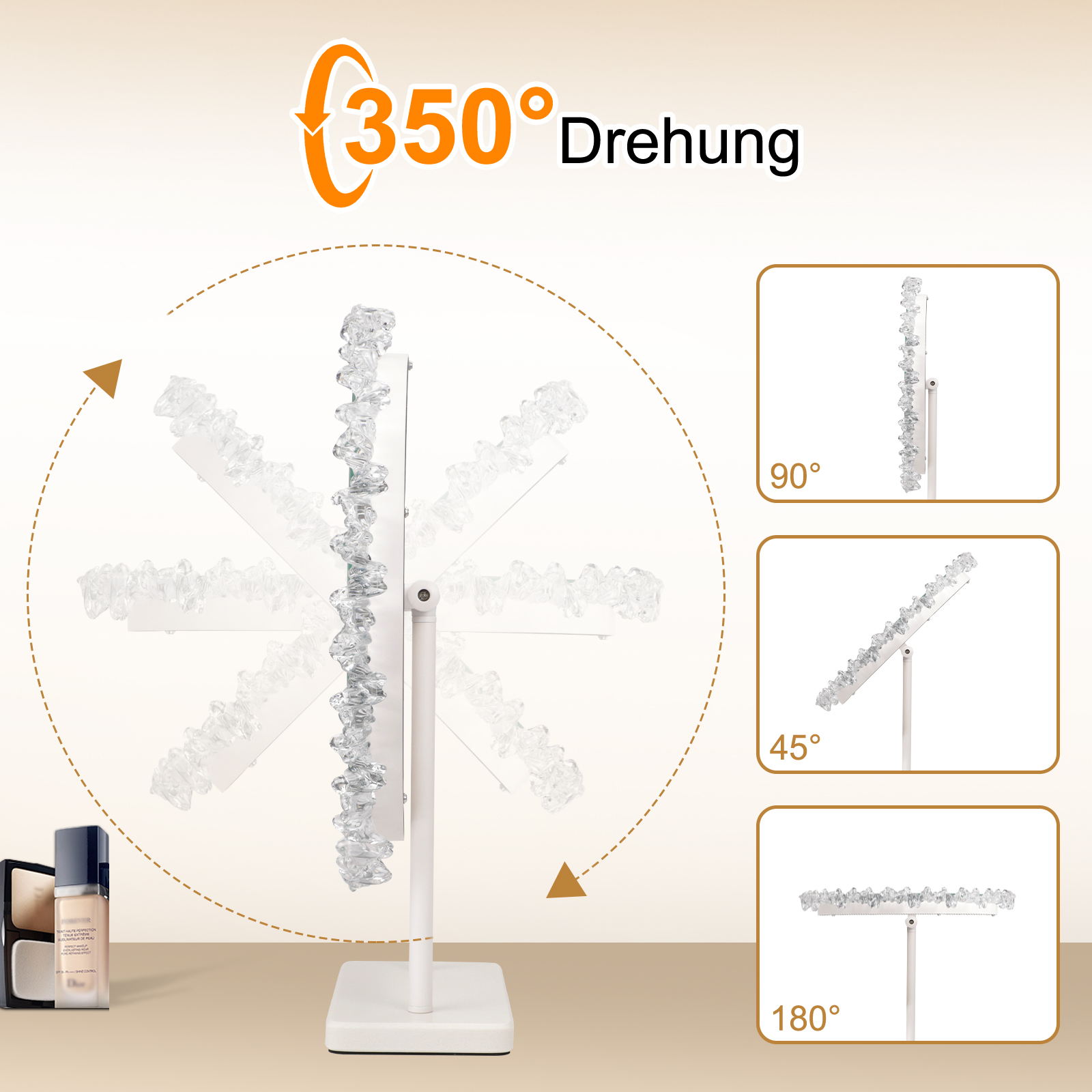 Ein drehbarer Spiegel mit Kristallbesatz, der 350 Grad dreht. Daneben sind Kosmetika.