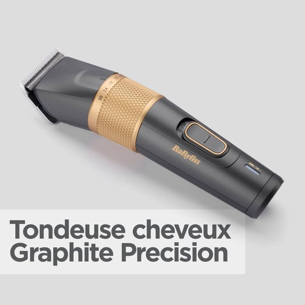 Grauer und goldener Haarschneider mit Babyliss-Logo und Längeneinstellungen.