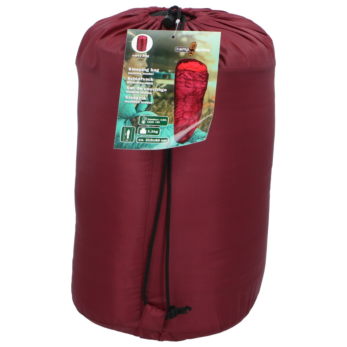 Un sac de couchage momie rouge foncé, emballé dans un sac de transport avec étiquette.