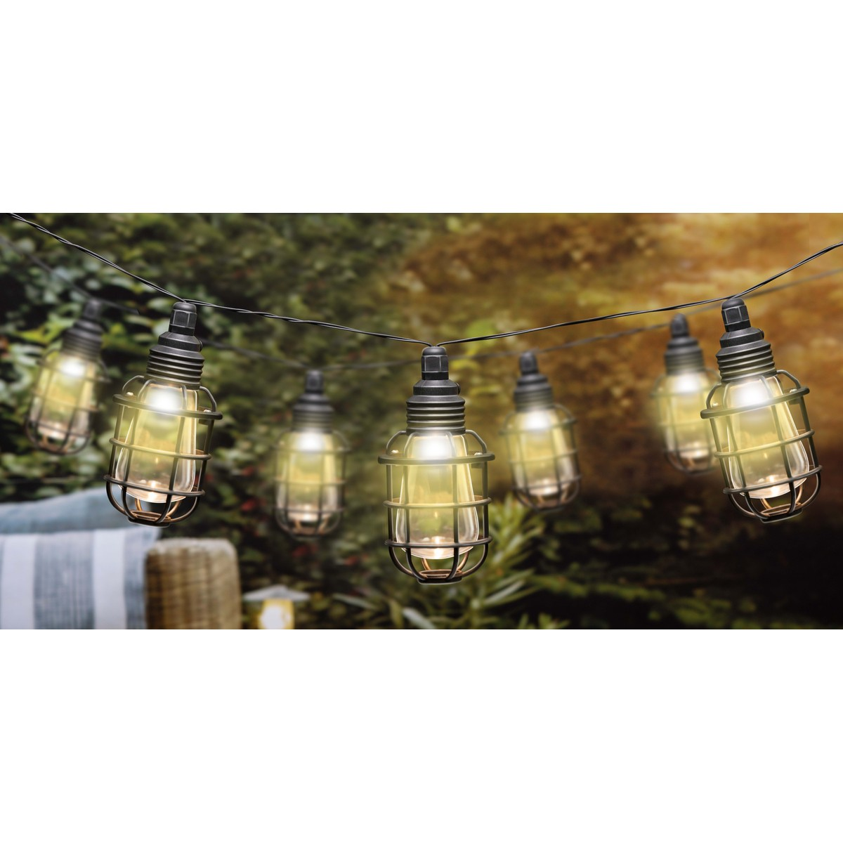 String of industrial-style bulbs hanging outdoors.