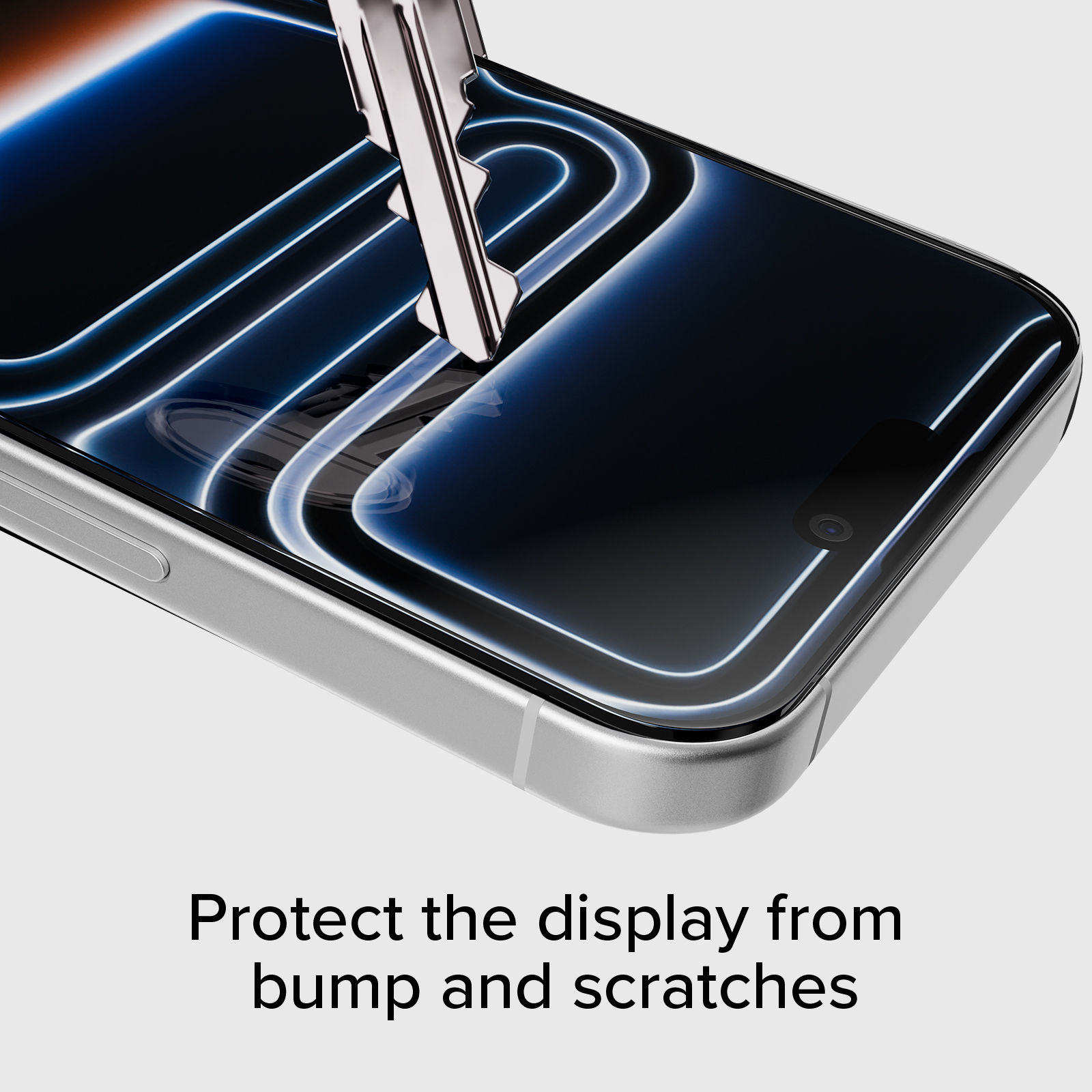 Una llave raspa la pantalla de un smartphone con efectos de luz azul.