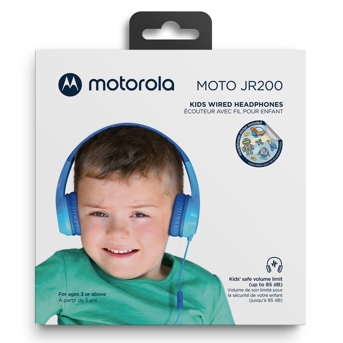 A boy wears blue Motorola headphones. The packaging shows the product and information.