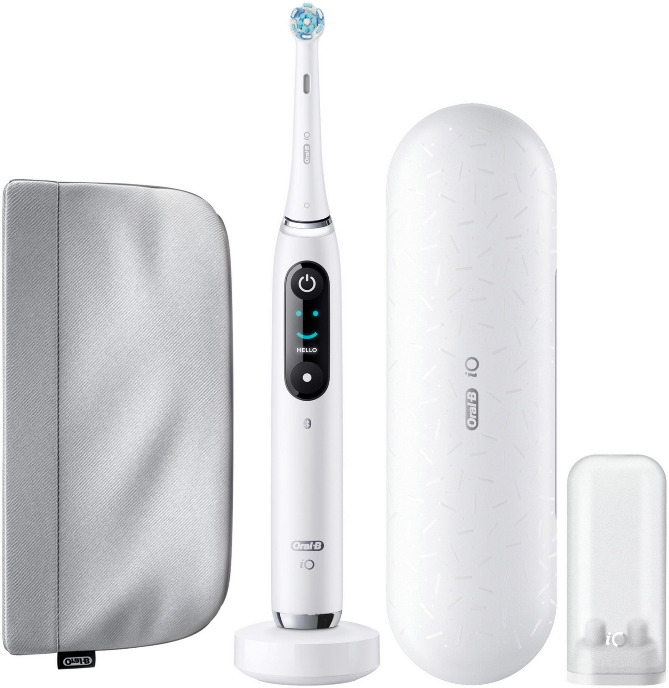 Un set di spazzolino elettrico Oral-B iO bianco con caricabatterie e custodie.