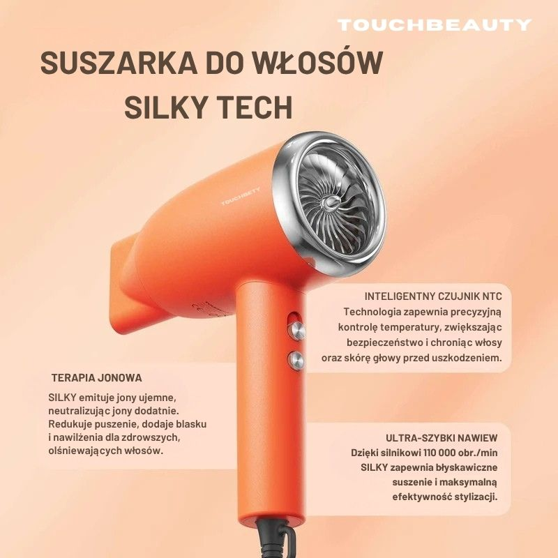 Pomarańczowa suszarka do włosów z srebrnymi akcentami na beżowym tle.