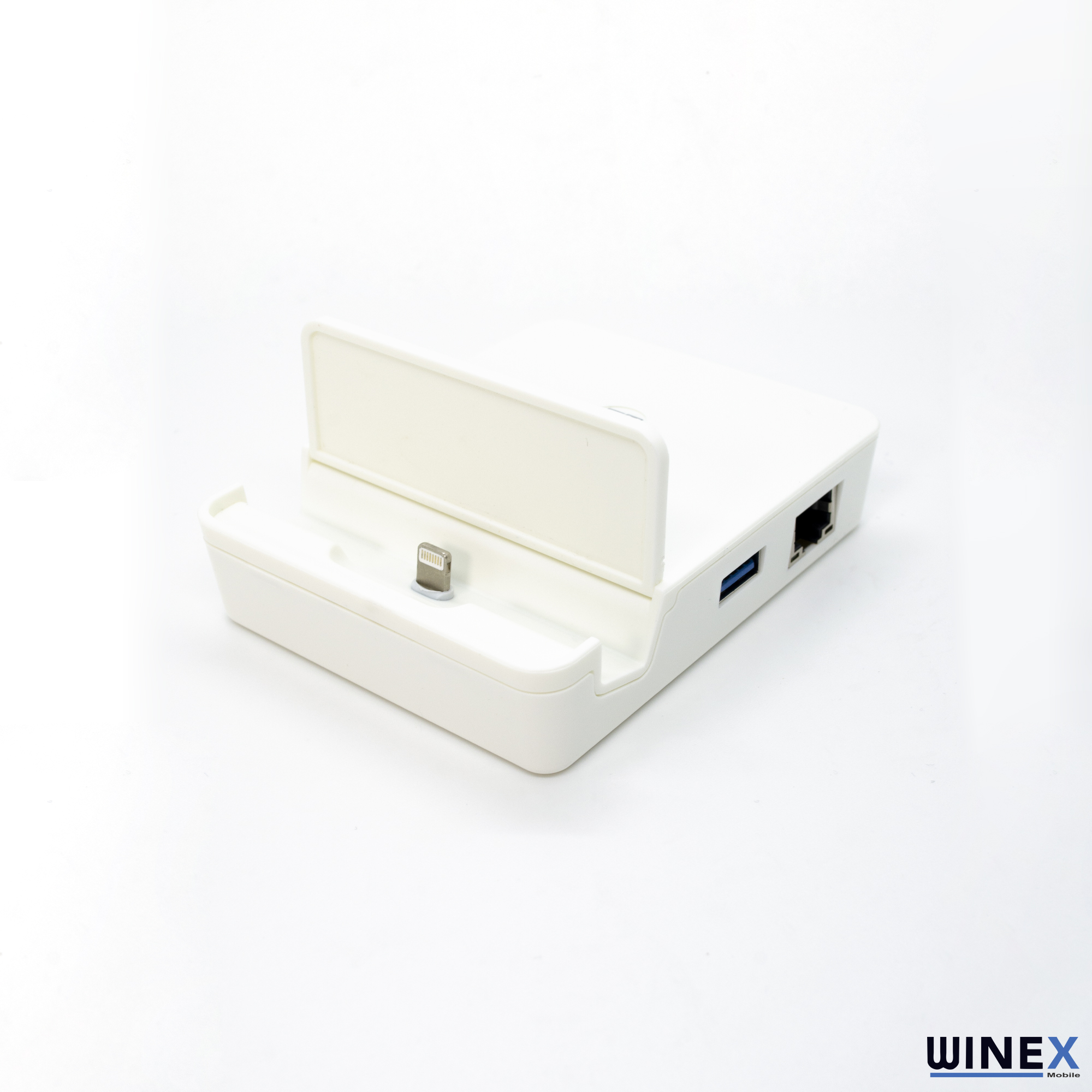 Şarj bağlantı noktası, USB ve ağ çıkışlarına sahip beyaz bir yerleştirme cihazı.