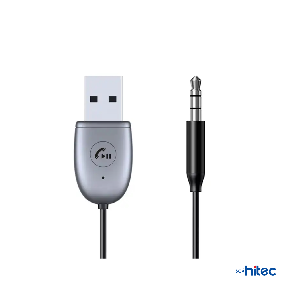 Beyaz arka planda jak fişli gümüş renkli USB adaptörü.