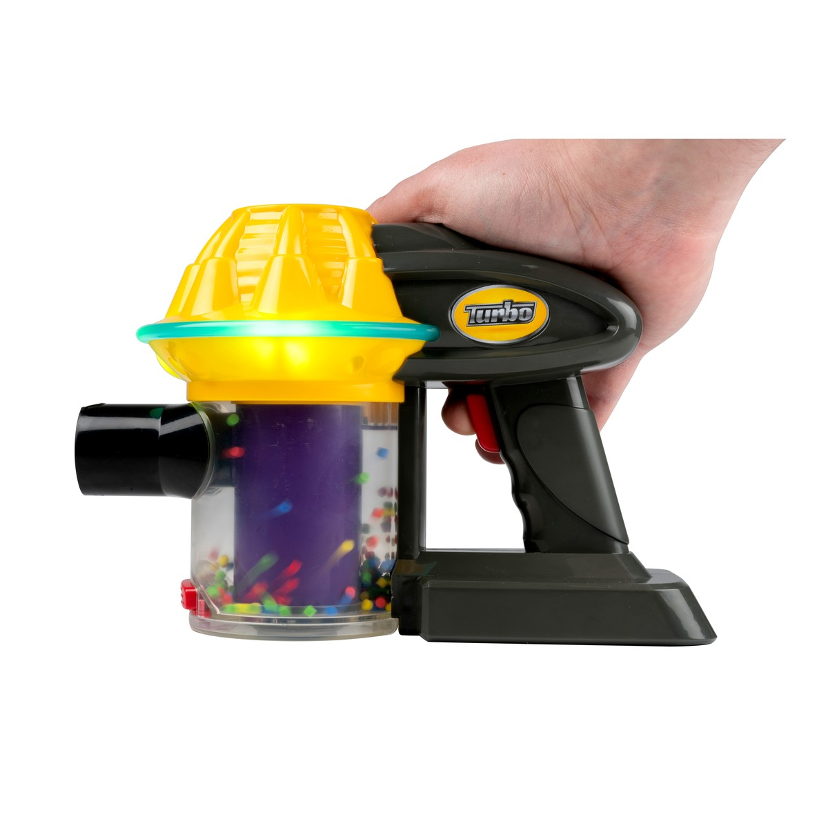 Hand holding a dark vacuum with yellow top and colorful beads visible inside.