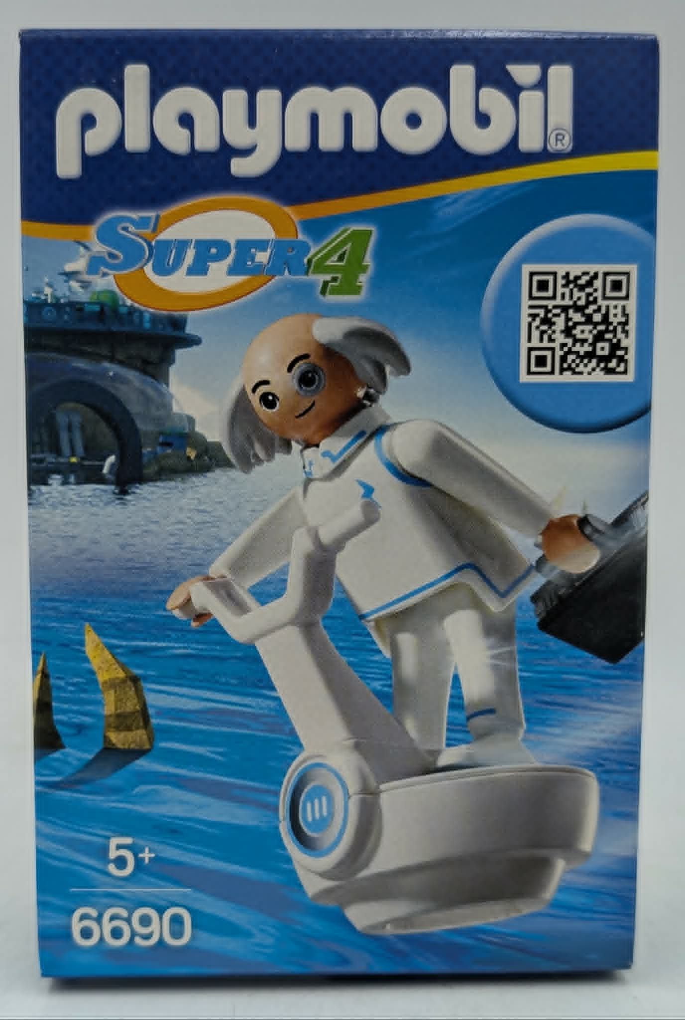 Playmobil Super 4 Box mit Figur auf einem Wasserfahrzeug, im Hintergrund Gebäude und Wasser.