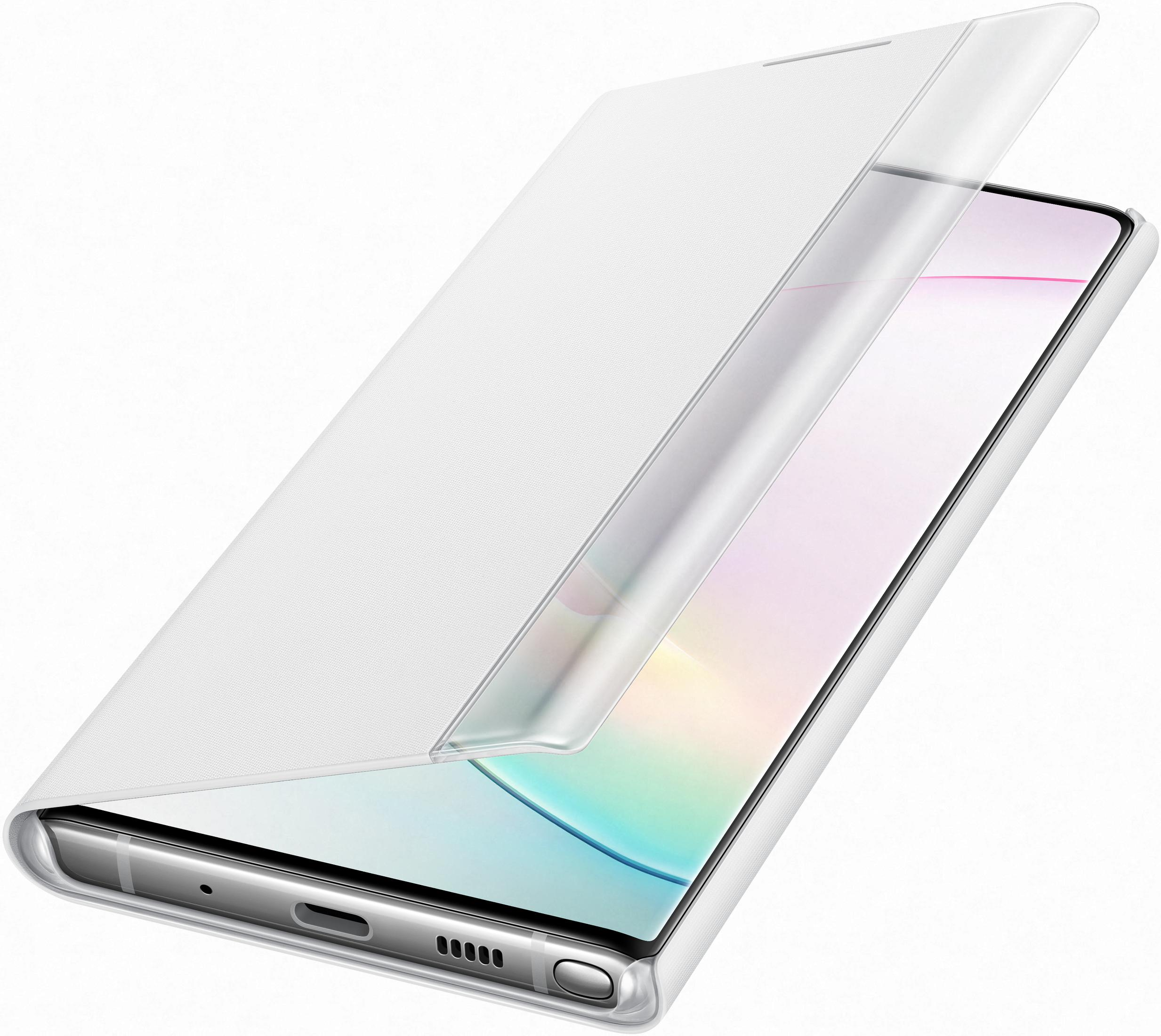 Uno smartphone bianco con schermo scintillante sotto una custodia parzialmente aperta.