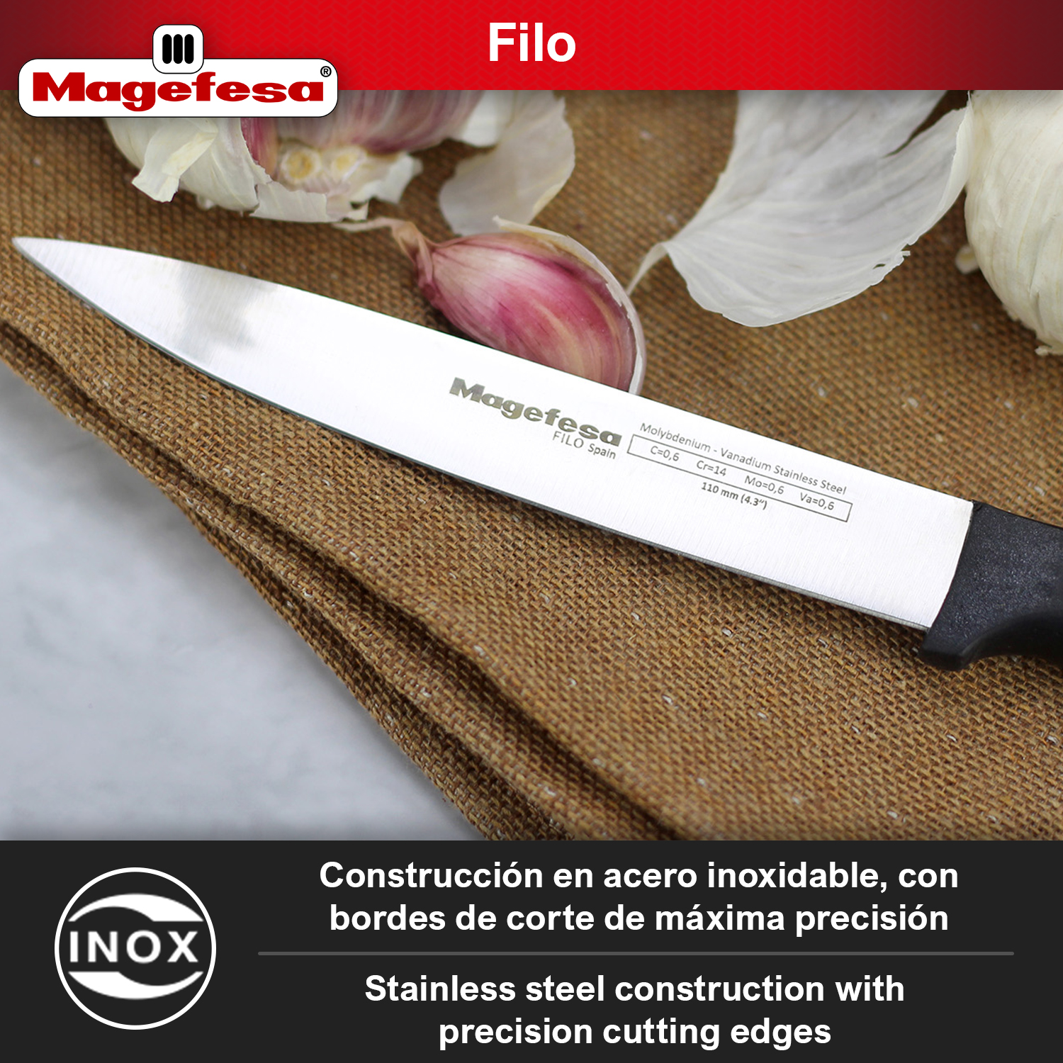 Un cuchillo de cocina con mango negro descansa sobre tela marrón junto a ajo.