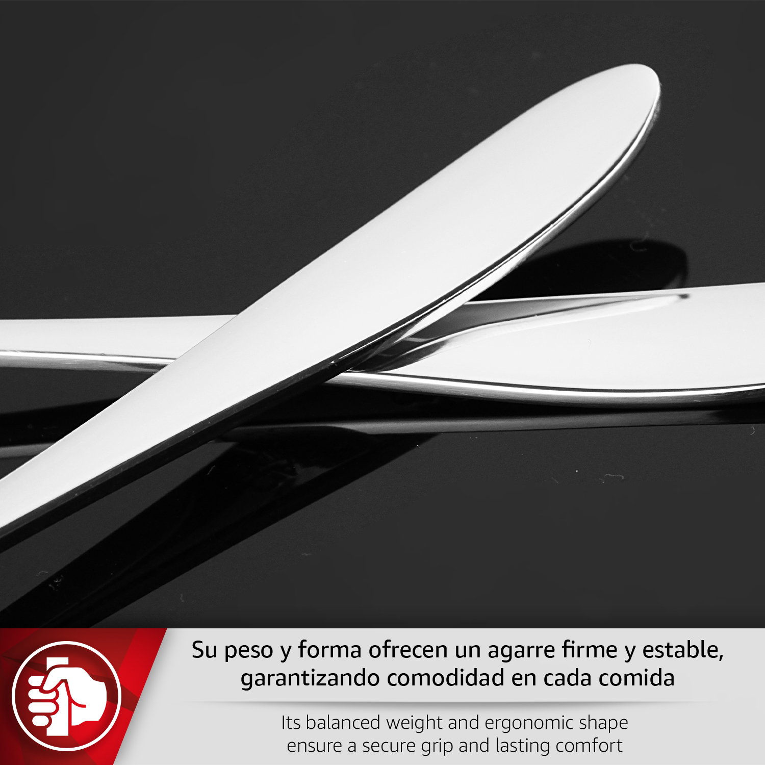 Dos cubiertos plateados brillantes sobre una superficie negra.