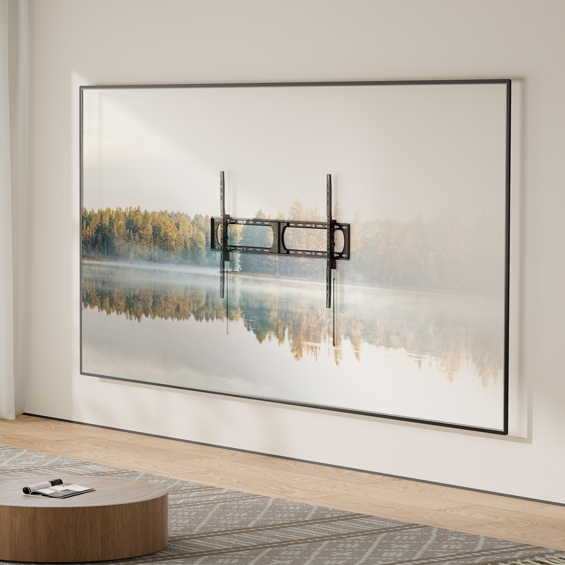 A black TV wall mount is mounted on a wall with a landscape image.