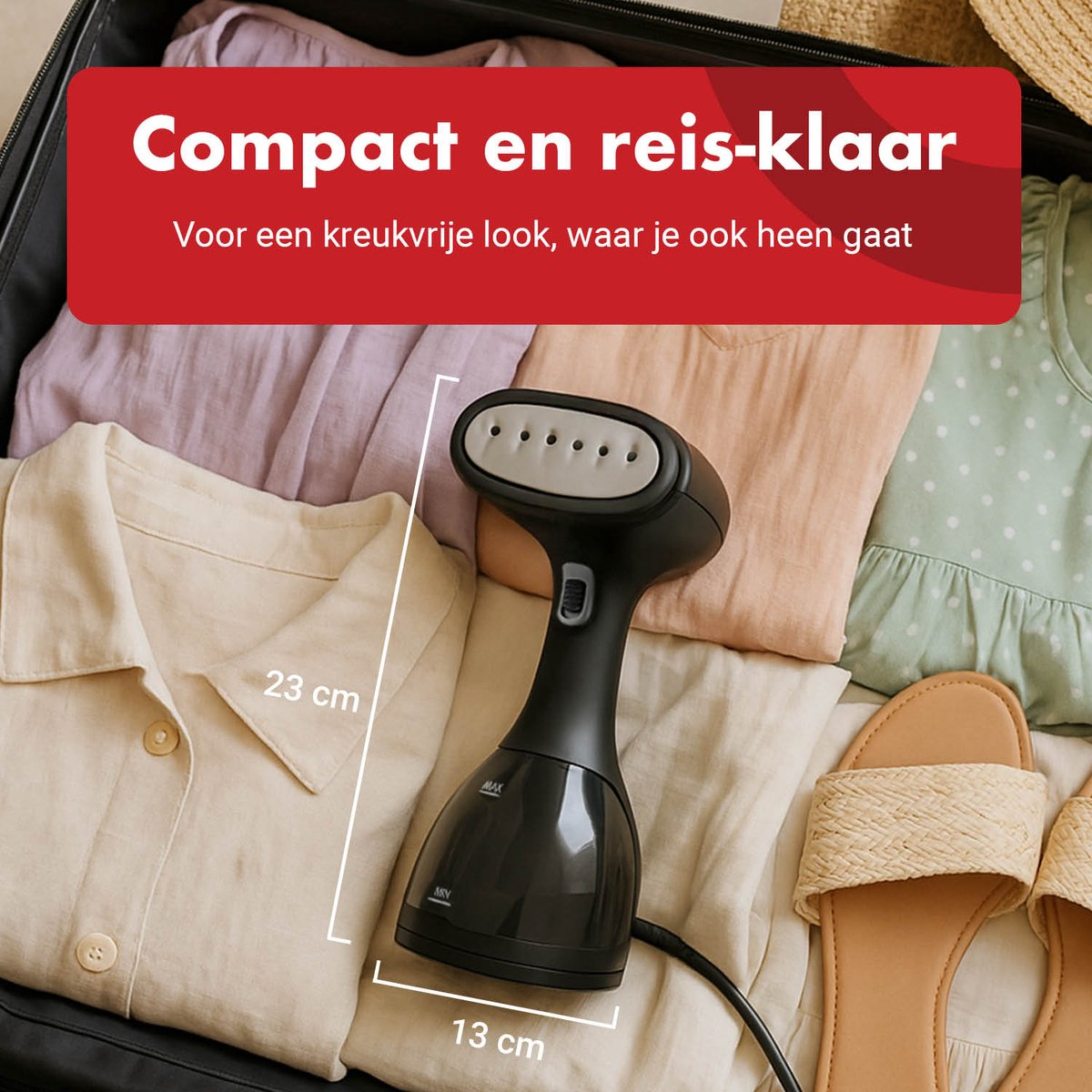 A black handheld steamer lies in a suitcase on clothes and sandals.