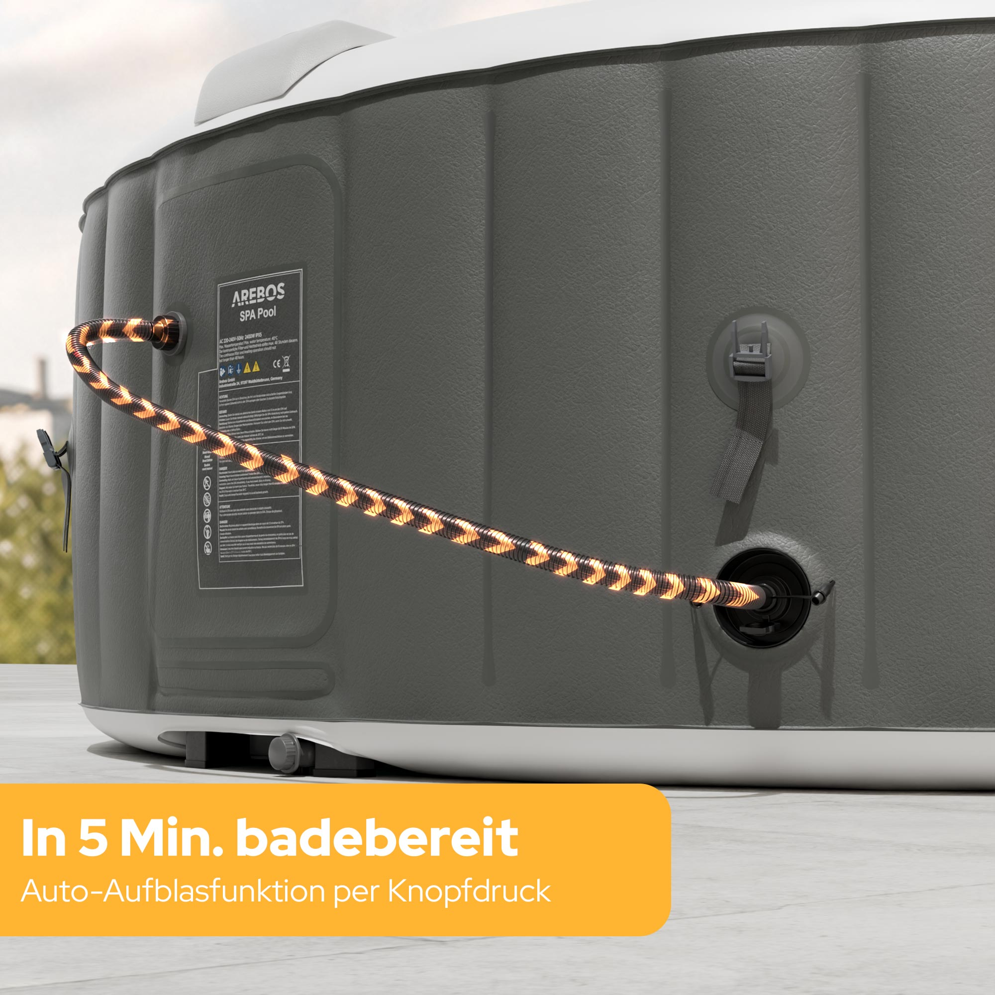 Grauer aufblasbarer Whirlpool mit orange-schwarzem Schlauch und Beschriftung.