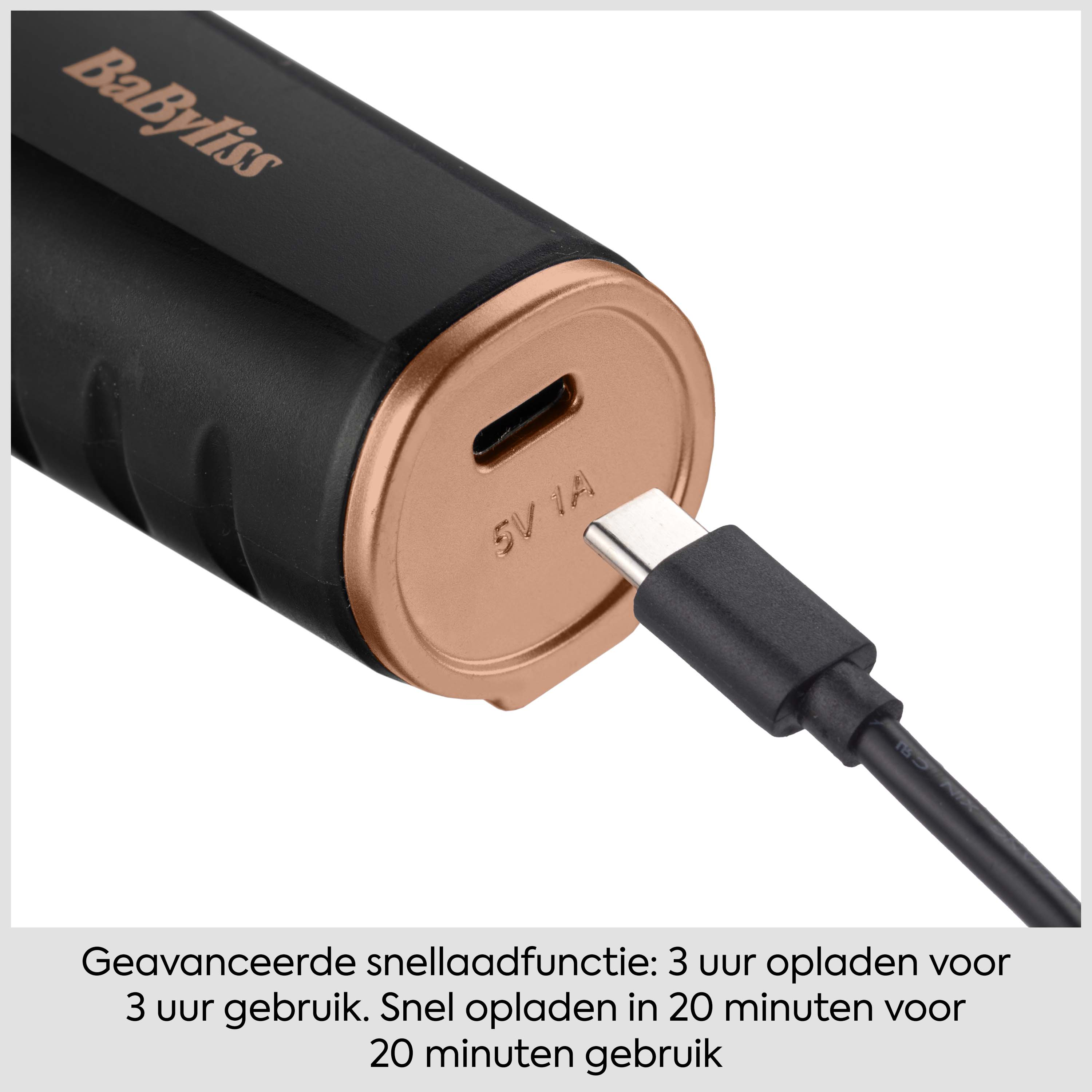 Un dispositivo BaByliss nero con bordo in rame in carica.