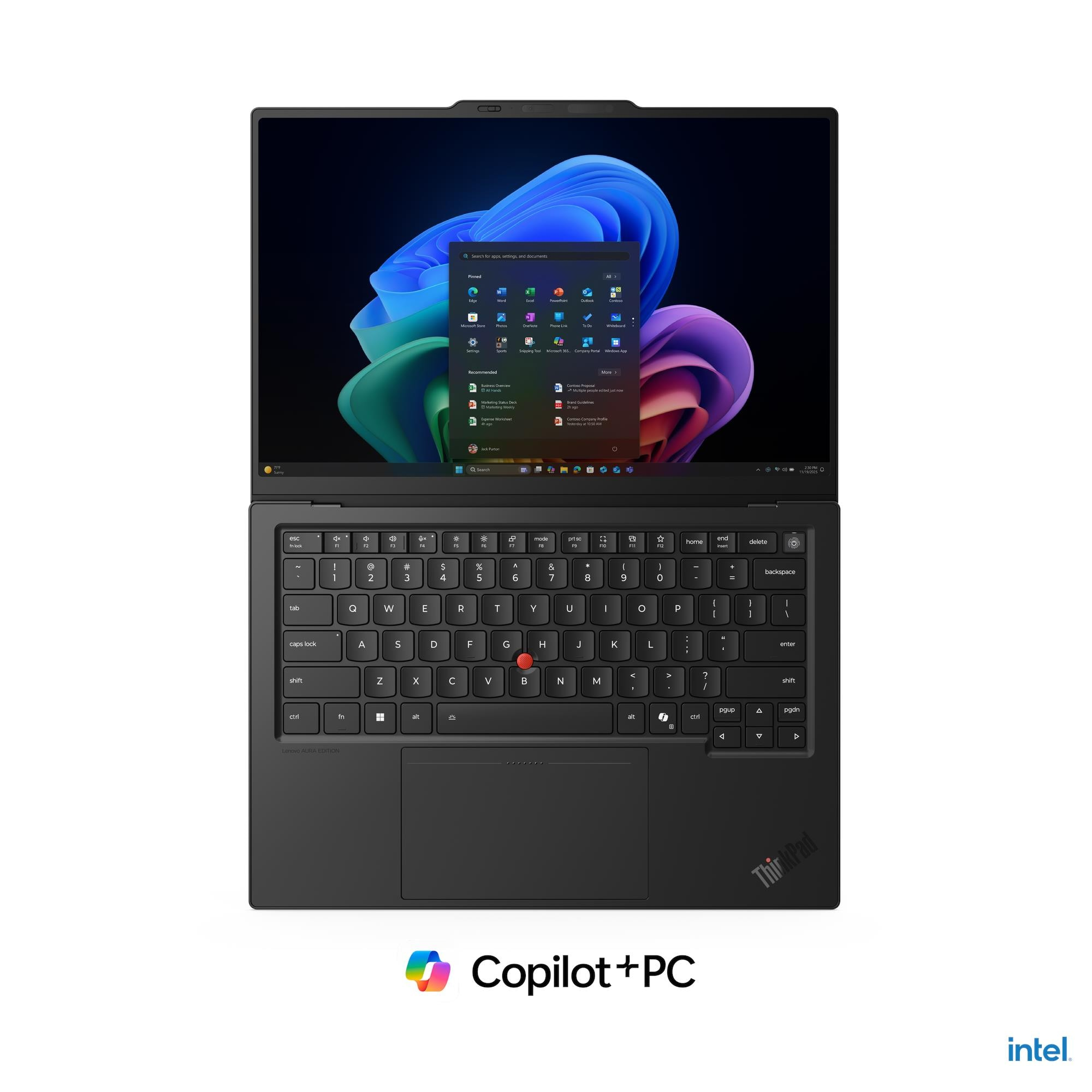 Un laptop Lenovo ThinkPad nero con uno sfondo astratto colorato sullo schermo.