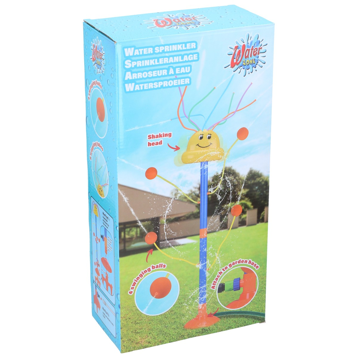A water sprinkler with a funny face spraying water.